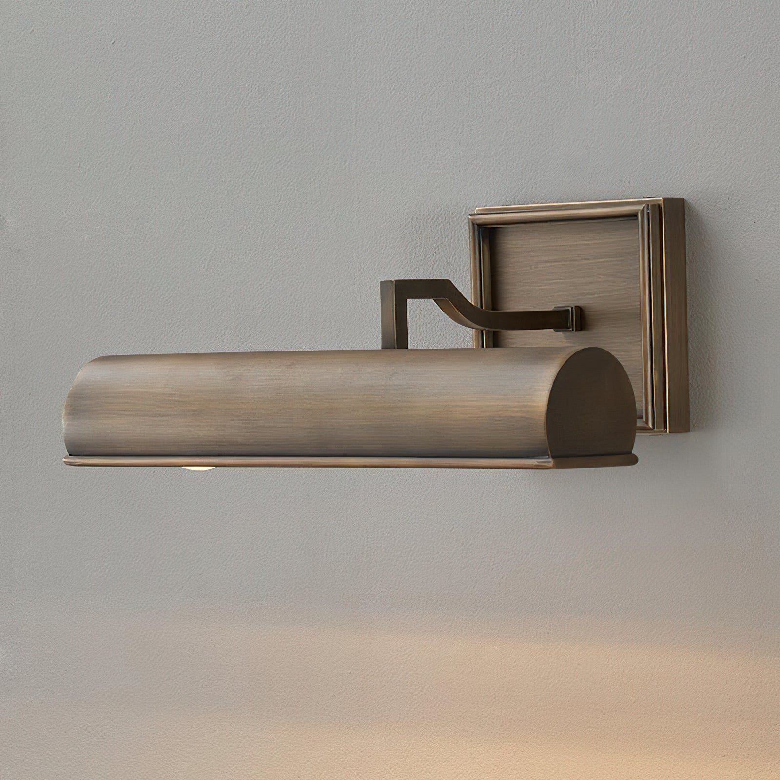 Chawton Wall Sconce in a hallway illuminating artwork.