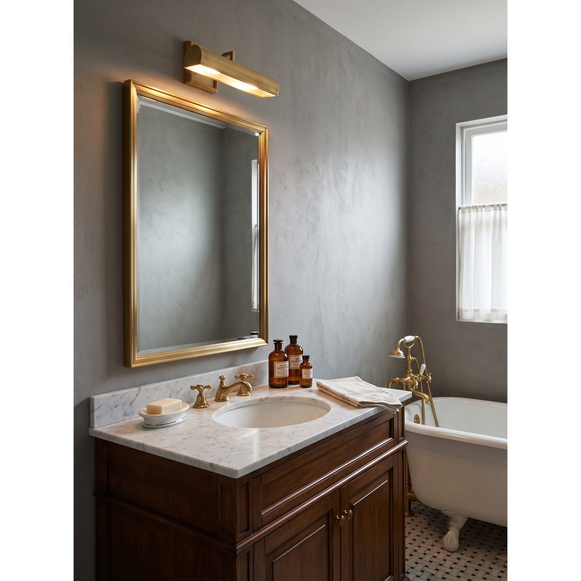 The 3-head Chawton Wall Sconce in Bronze Antiquing finish.