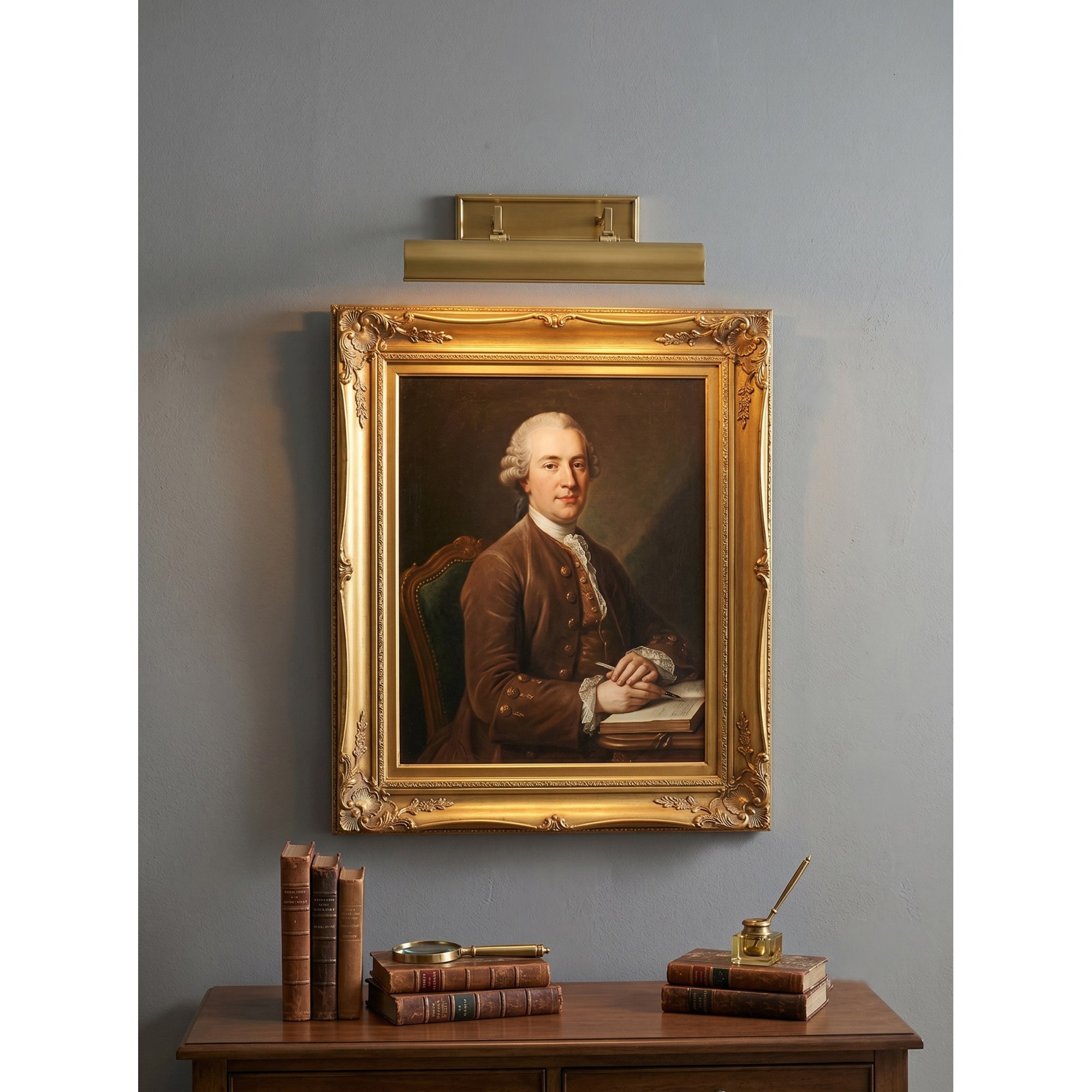 Lifestyle image of the Chawton Wall Sconce in a modern library.