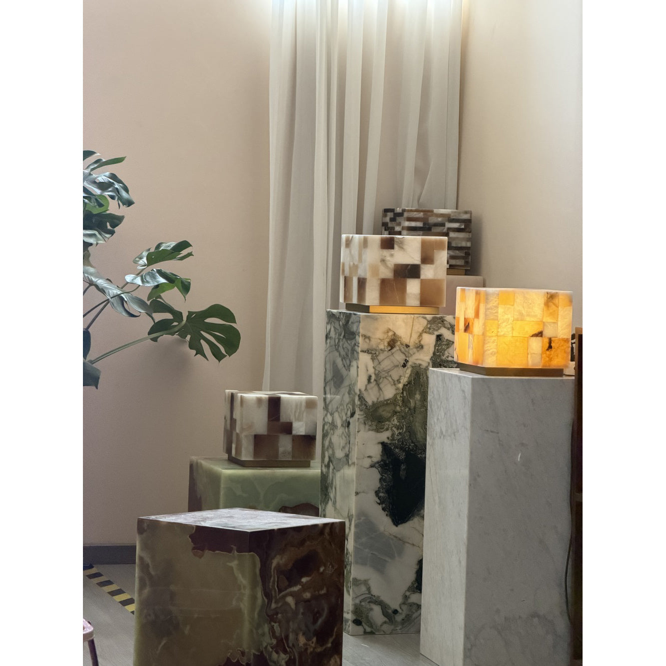 The lamp shown in a dimly lit, cozy room setting.