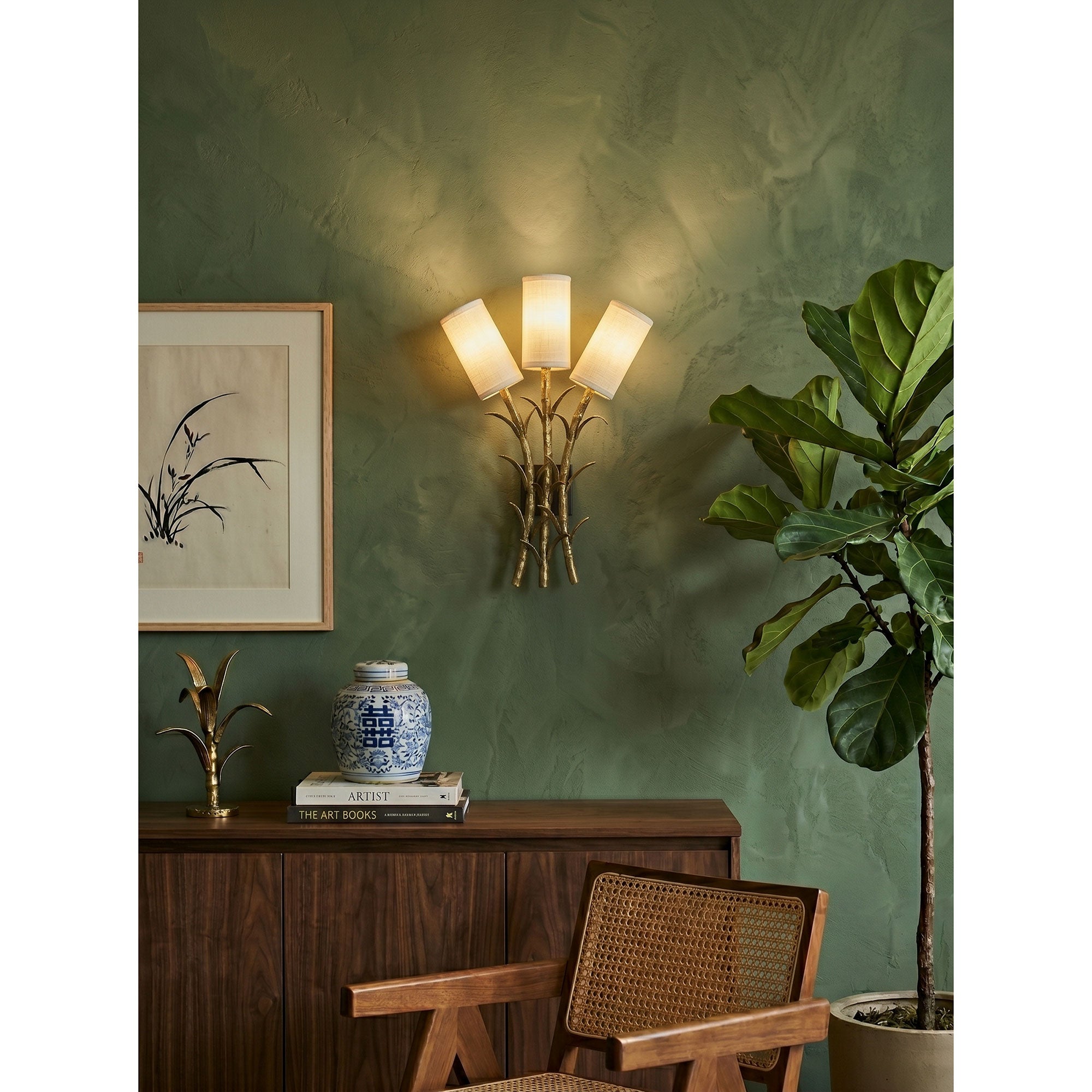 A pair of Chelsea Wall Sconces flanking a large mirror in an entryway.