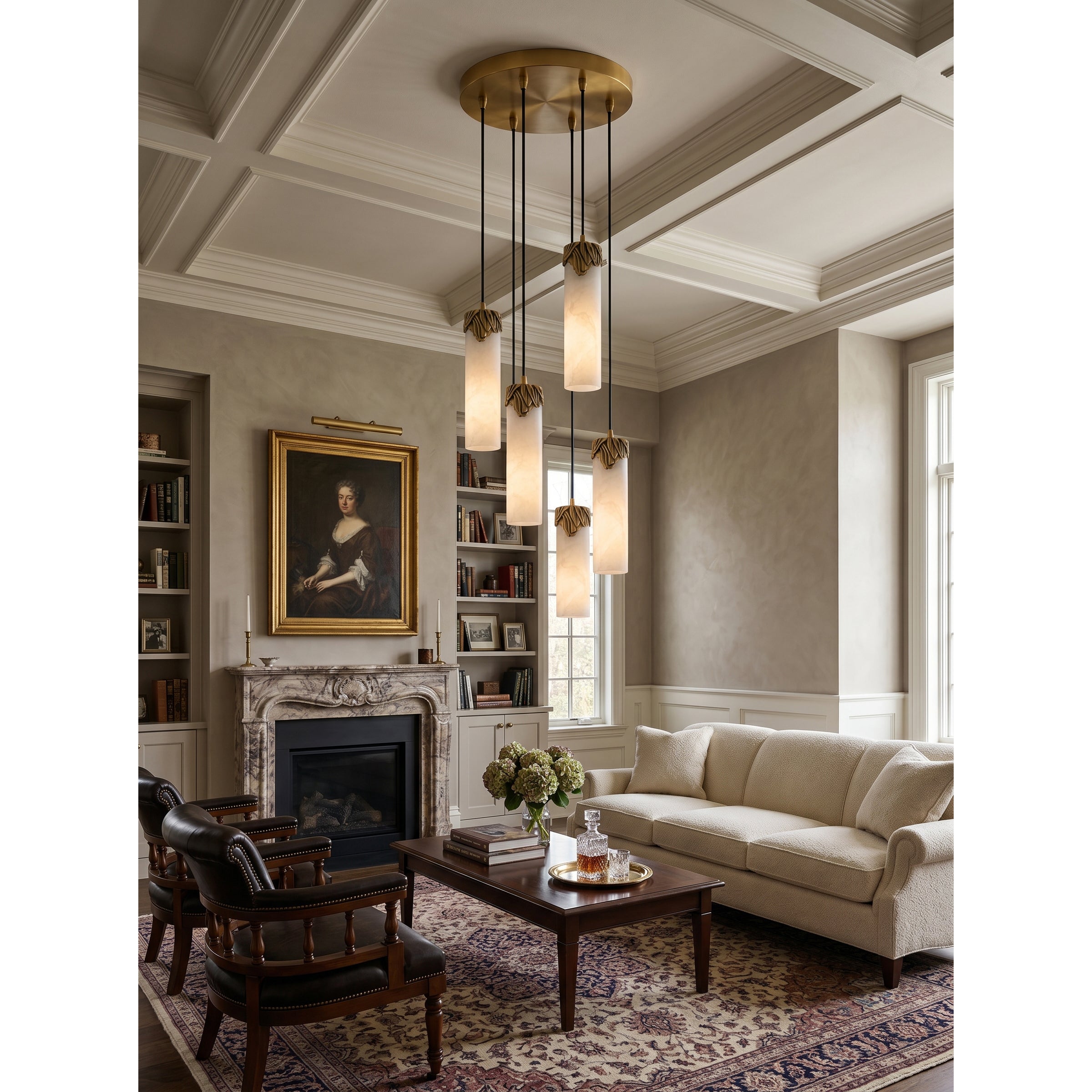 The brass body and canopy of the Dansani Lyra chandelier.