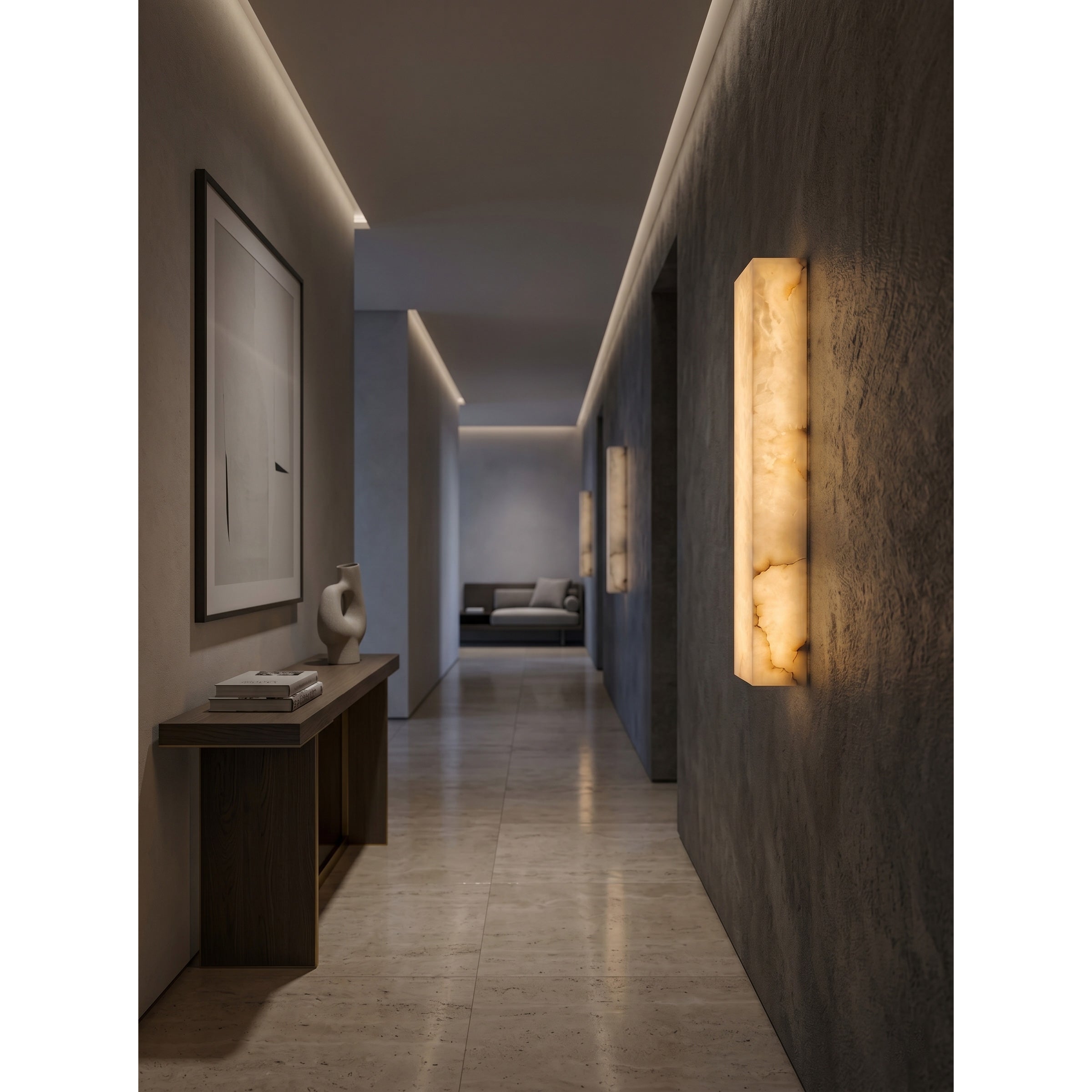 Dara wall sconce in a primary suite, providing soft light.