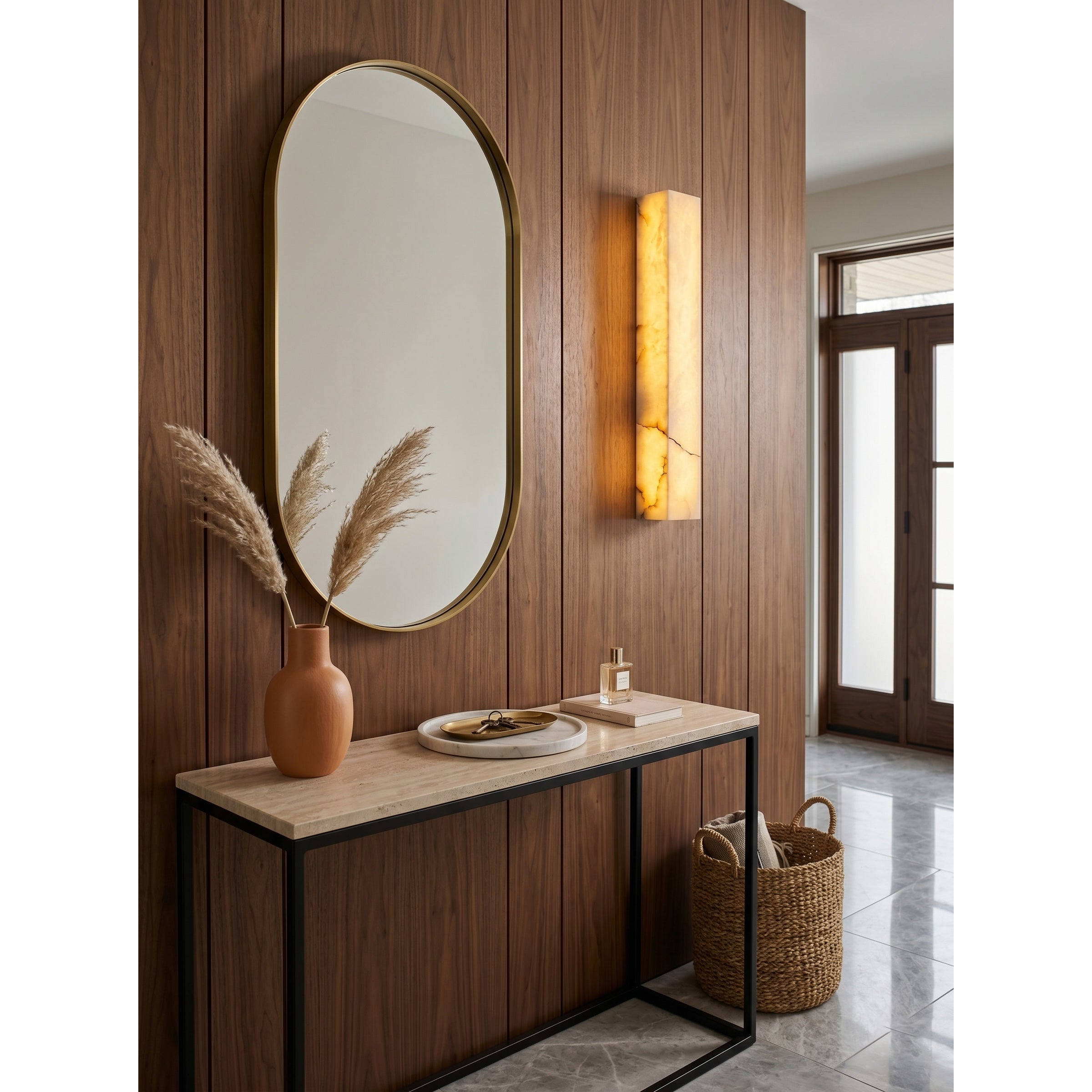 Front view of the sleek, vertical Dara wall sconce.