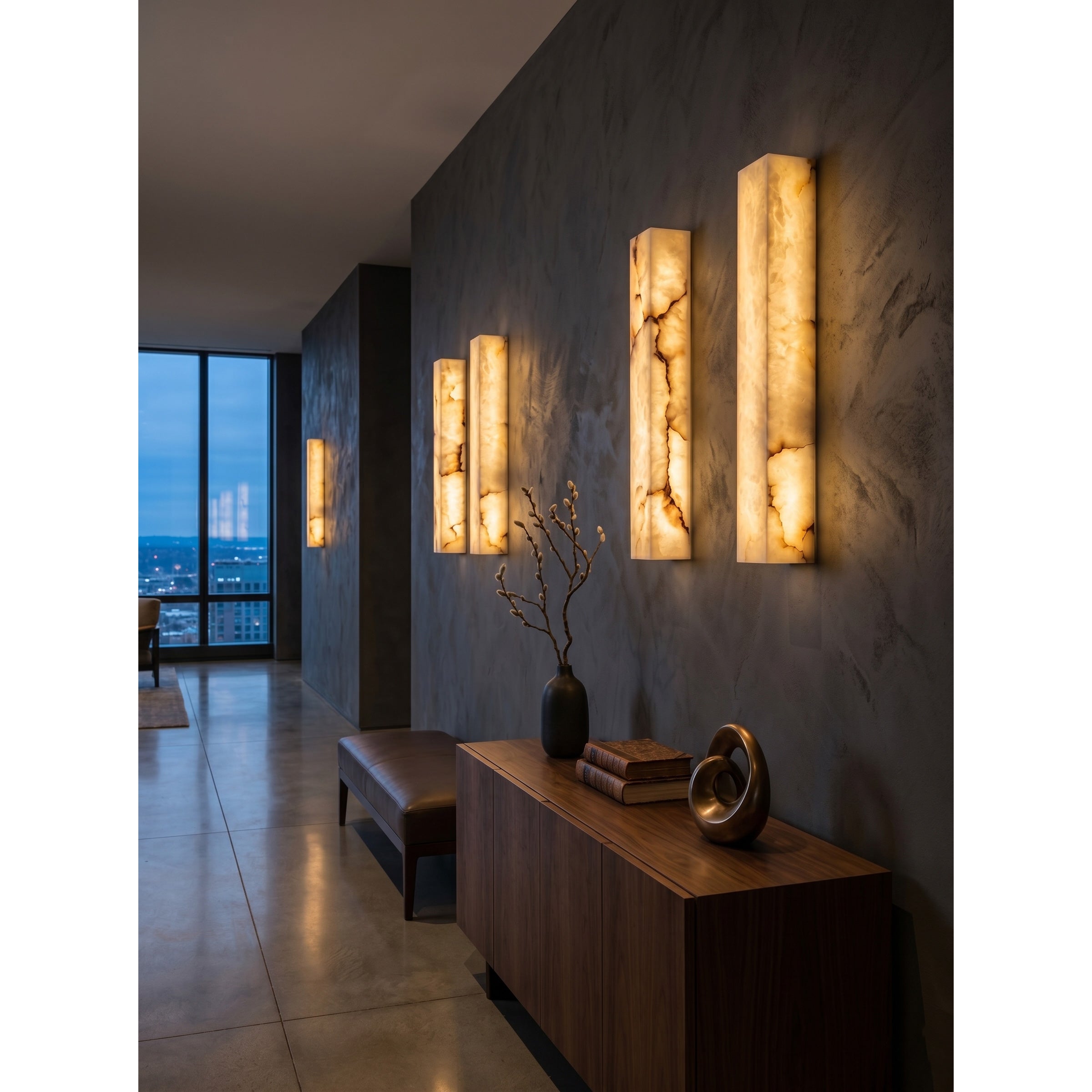 The texture of the carved alabaster on the Dara sconce.