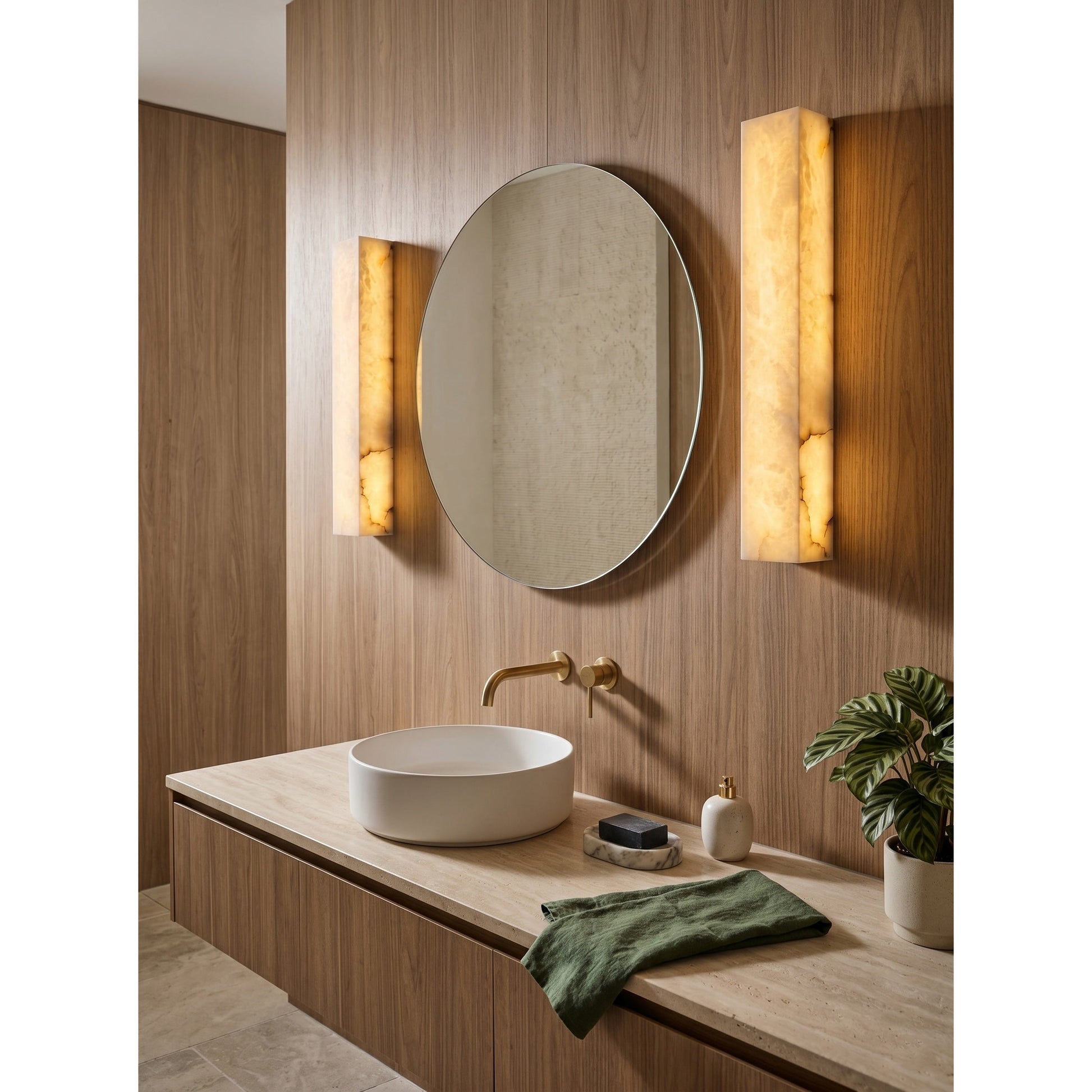 Lifestyle image of the Dara wall sconce in a home office.