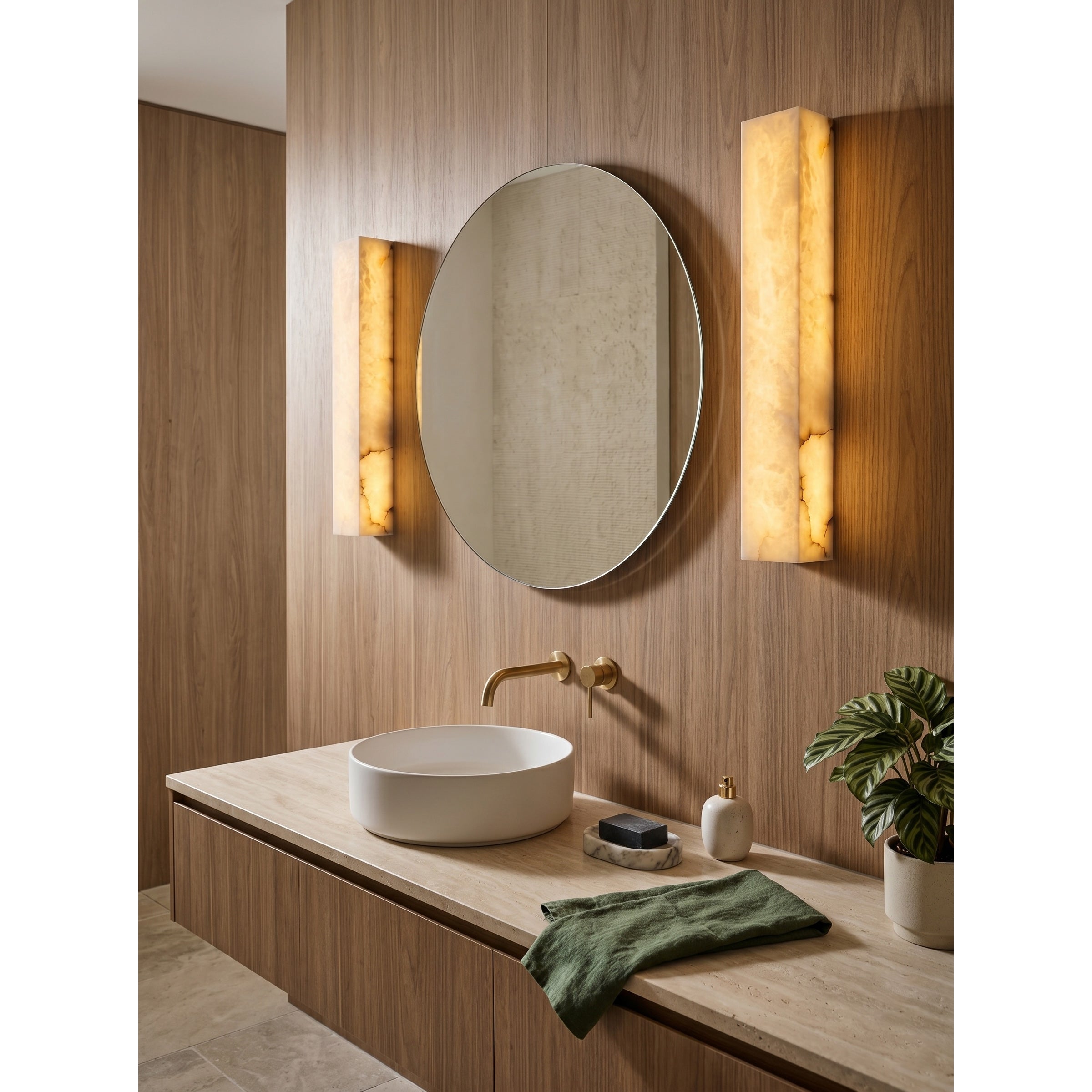 Lifestyle image of the Dara wall sconce in a home office.