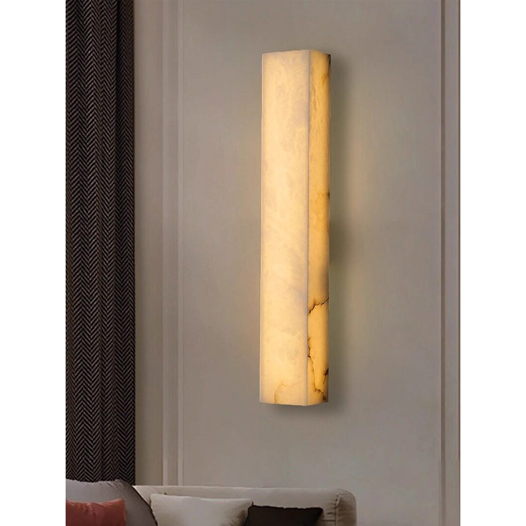 Dara wall sconce turned off, showing the natural white alabaster.