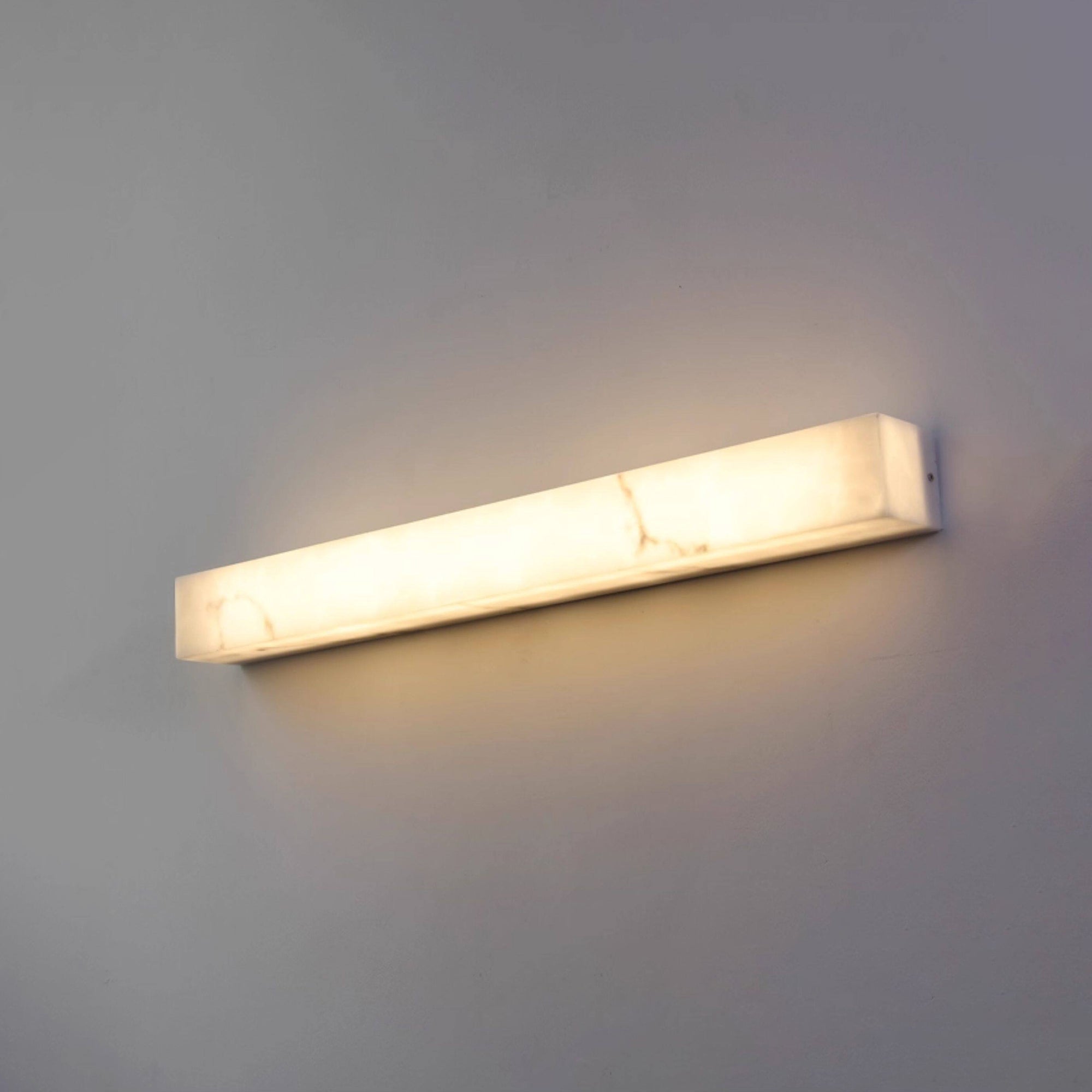 The seamless block construction of the Dara wall sconce.