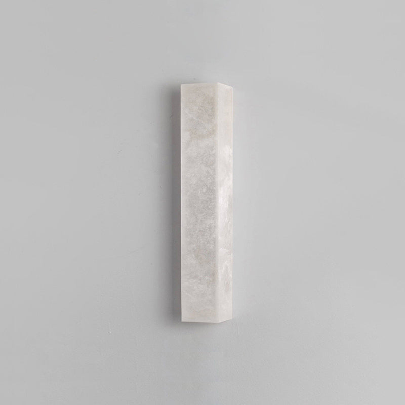 The 70cm Dara wall sconce next to a doorway.