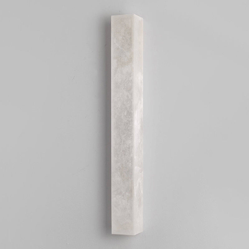 Dara wall sconce in a contemporary dining area.