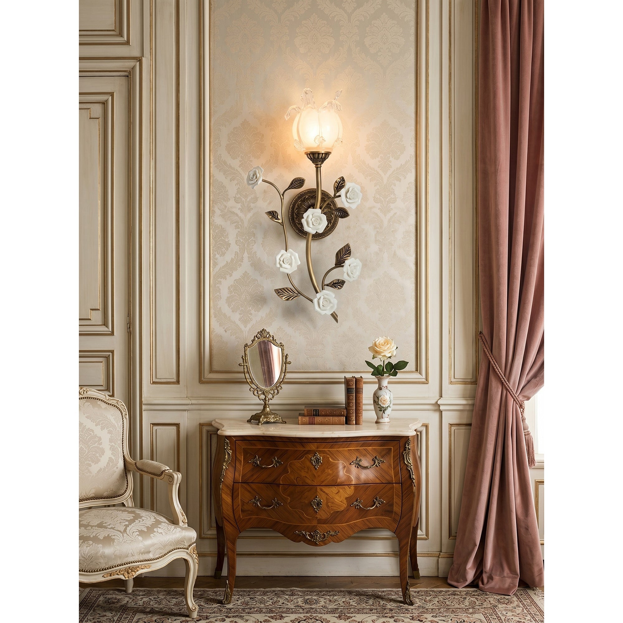 The sconce shown unlit to display the colors of the pink roses and bronze frame.