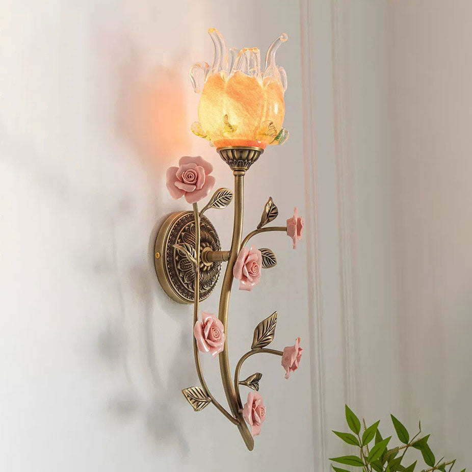 The Ember & Blossom sconce casting soft shadows on the wall.