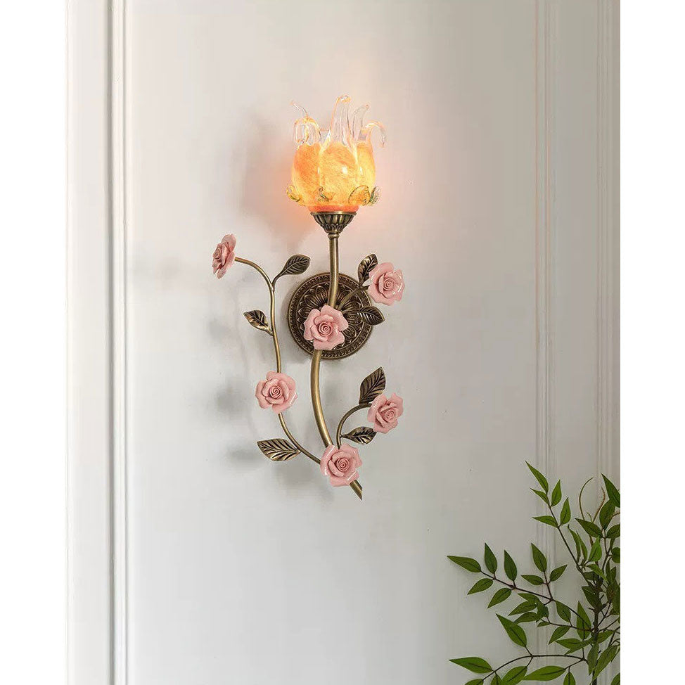 A full-length shot of the tall, elegant wall sconce.