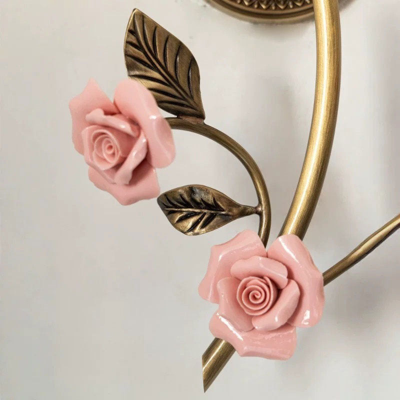 The sconce shown with a candelabra bulb installed (bulb not included).