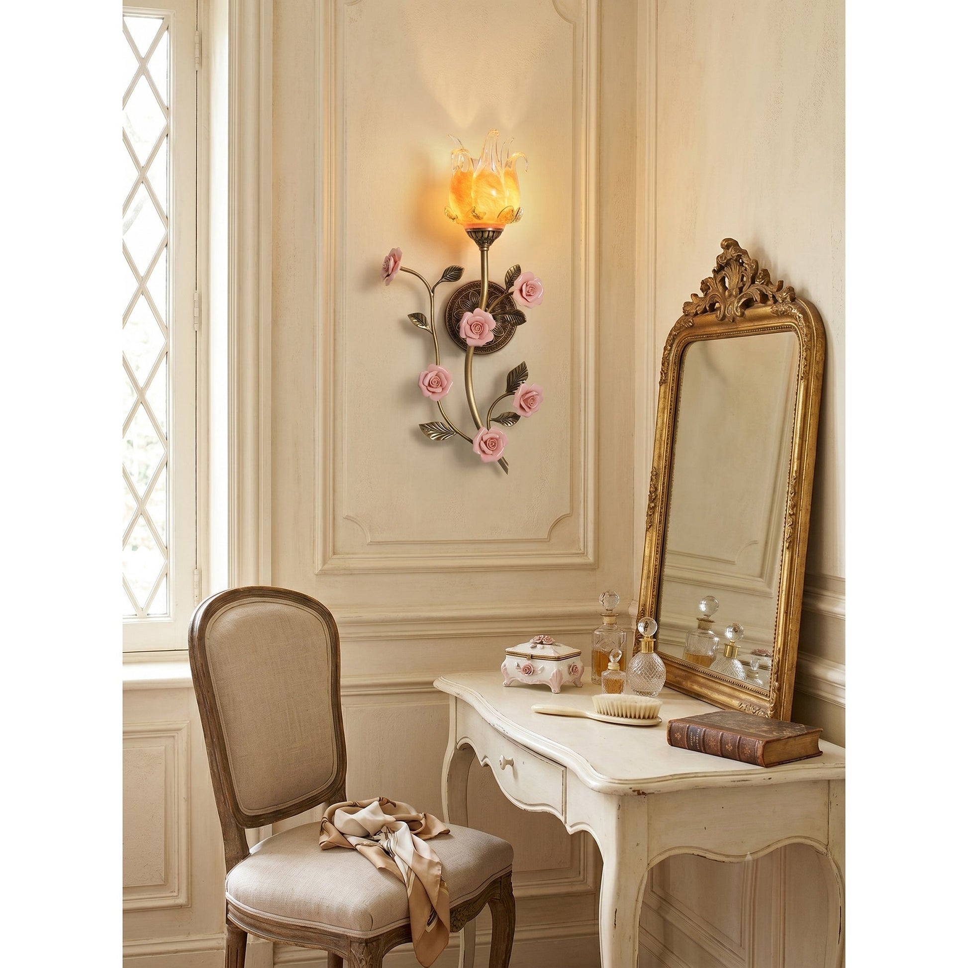 A pair of Ember & Blossom sconces flanking a vanity mirror in a powder room.