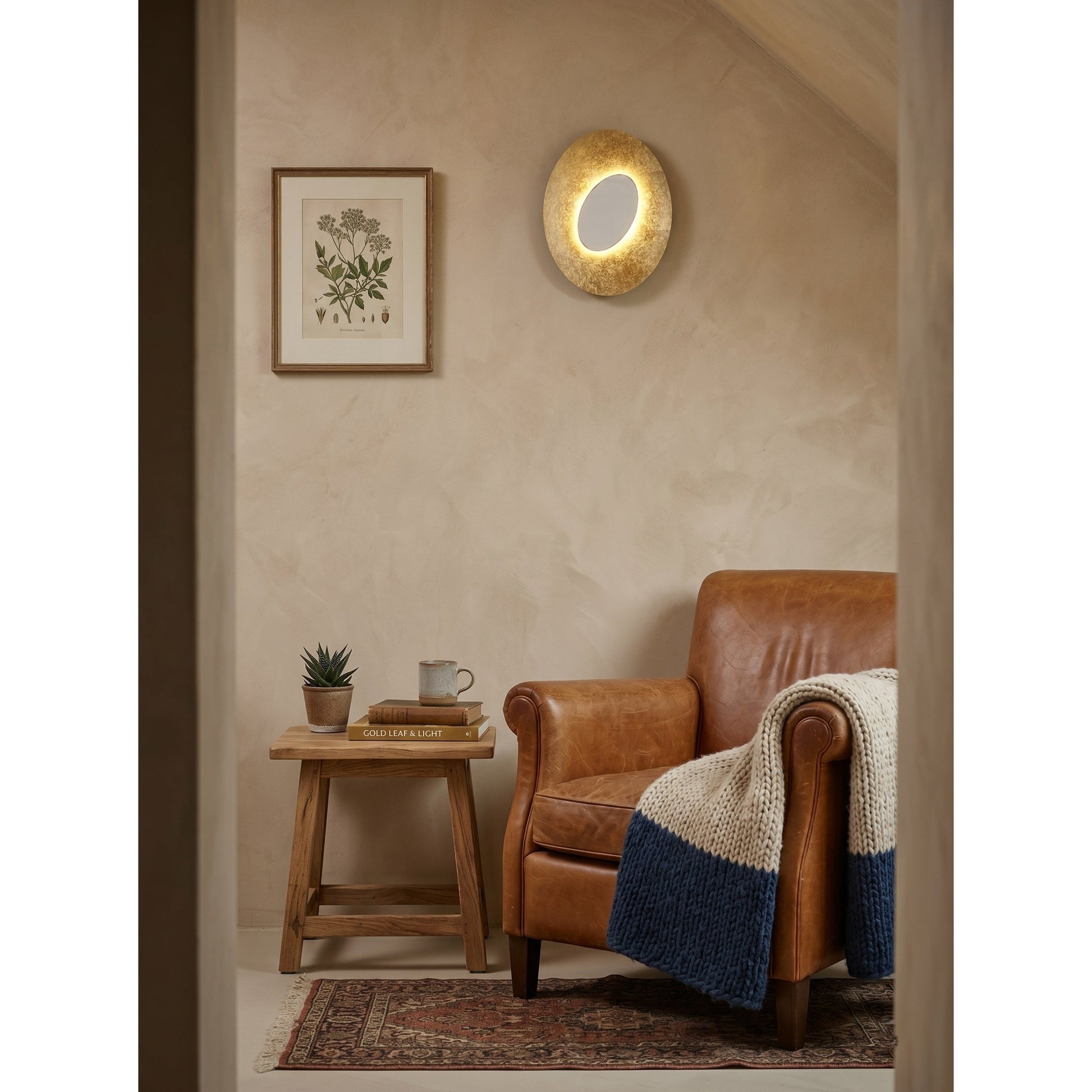 The medium size option of the Escale Blade Wall Sconce.