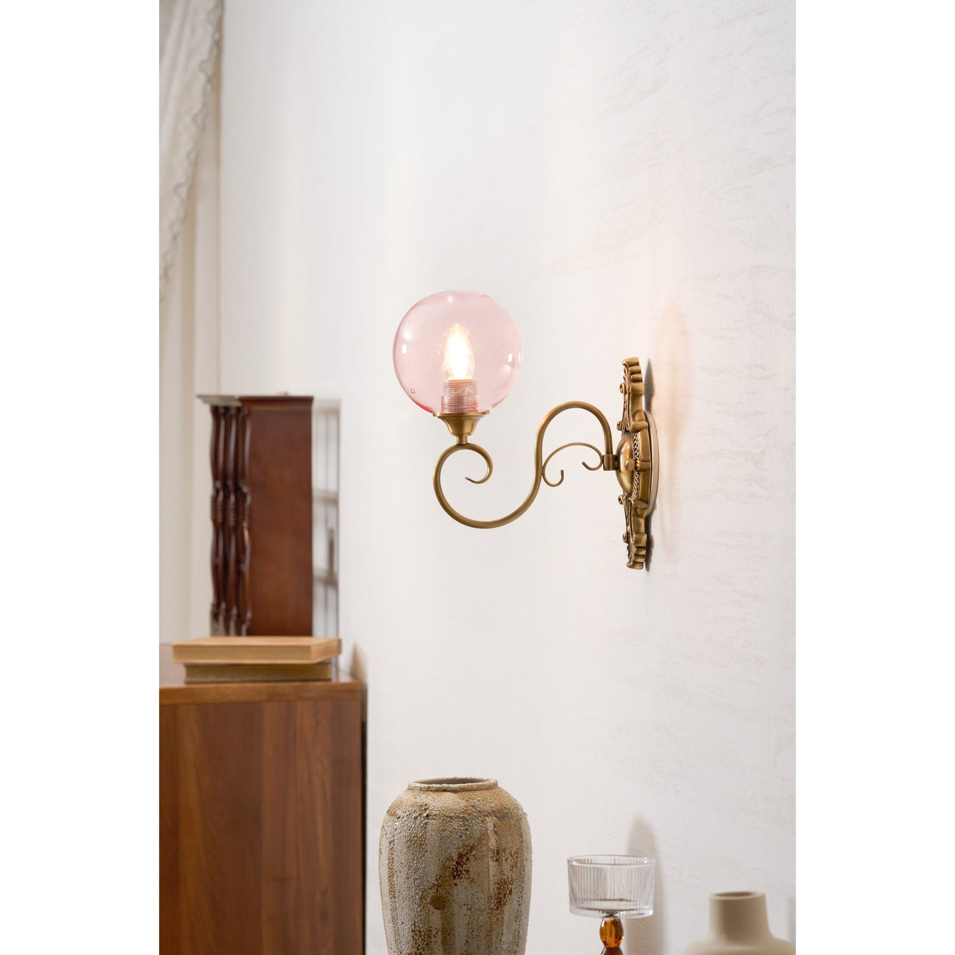 The Evelyn Wall Lamp in clear finish, shown from the front.