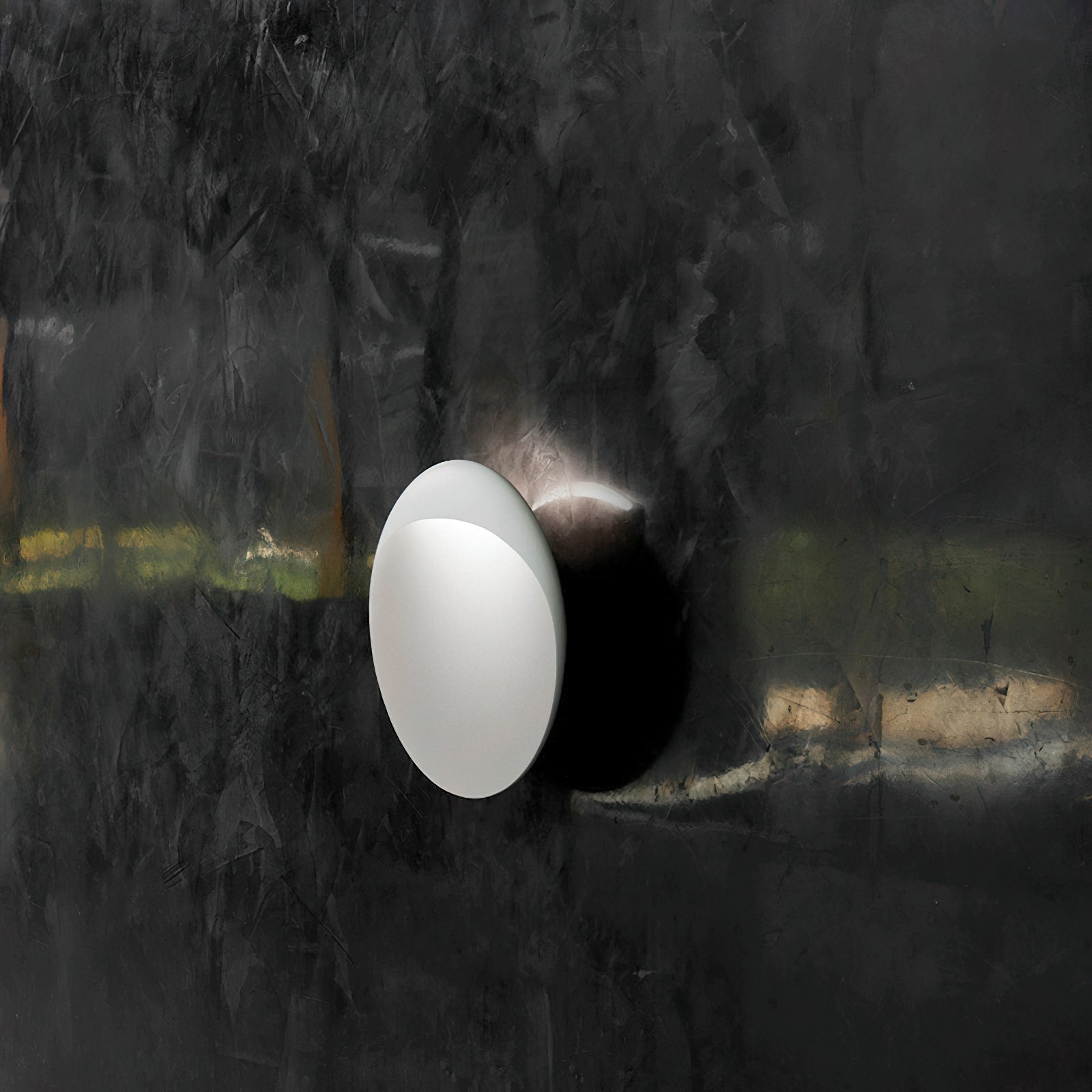 Flindt Round Wall Sconce in brick red, as a statement piece.