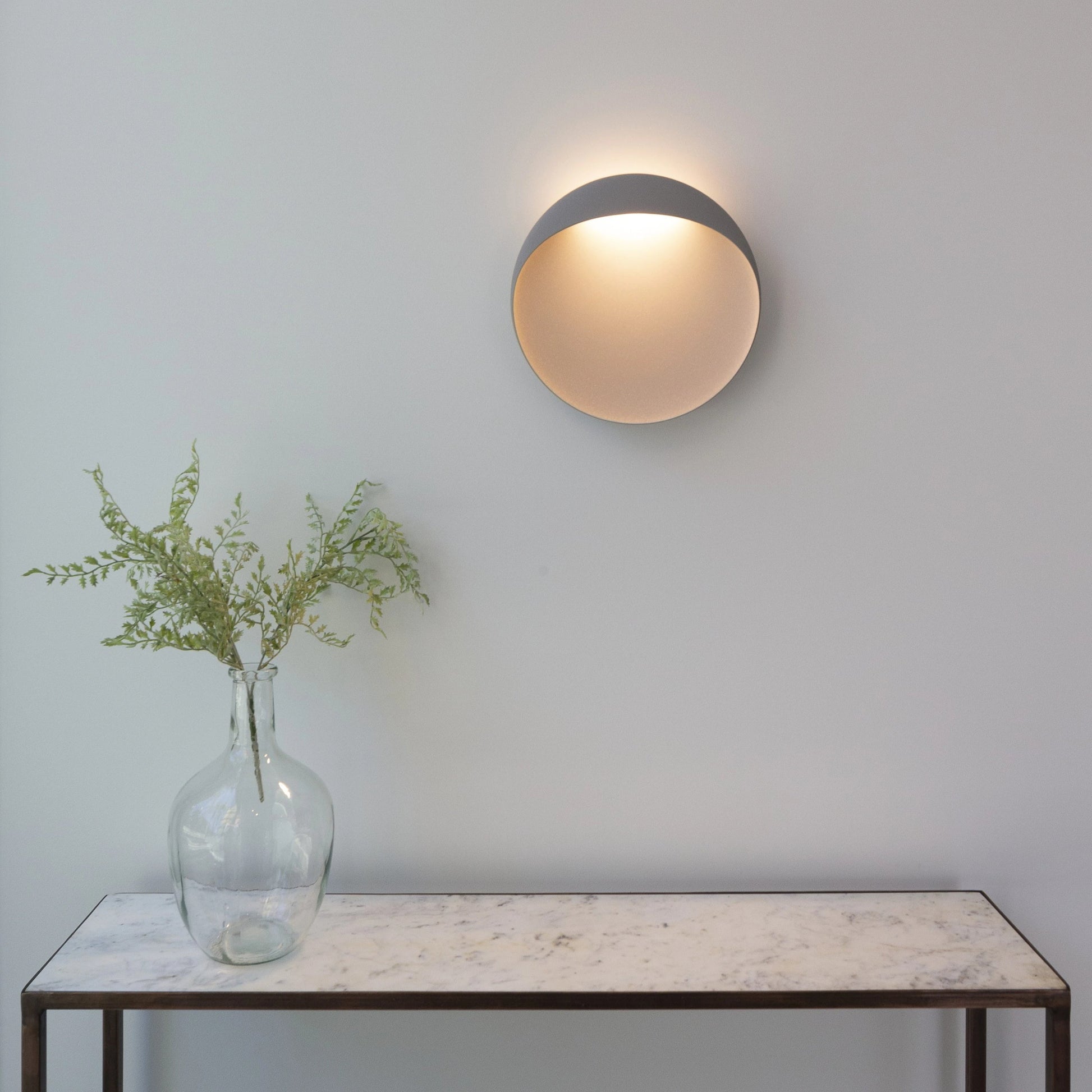 Close-up of the aluminum texture on the Flindt sconce.