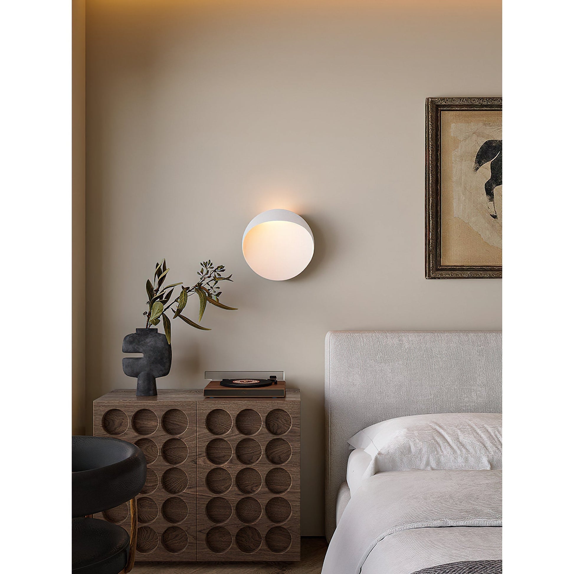 Dark gray Flindt sconce in a Japandi-style living room.