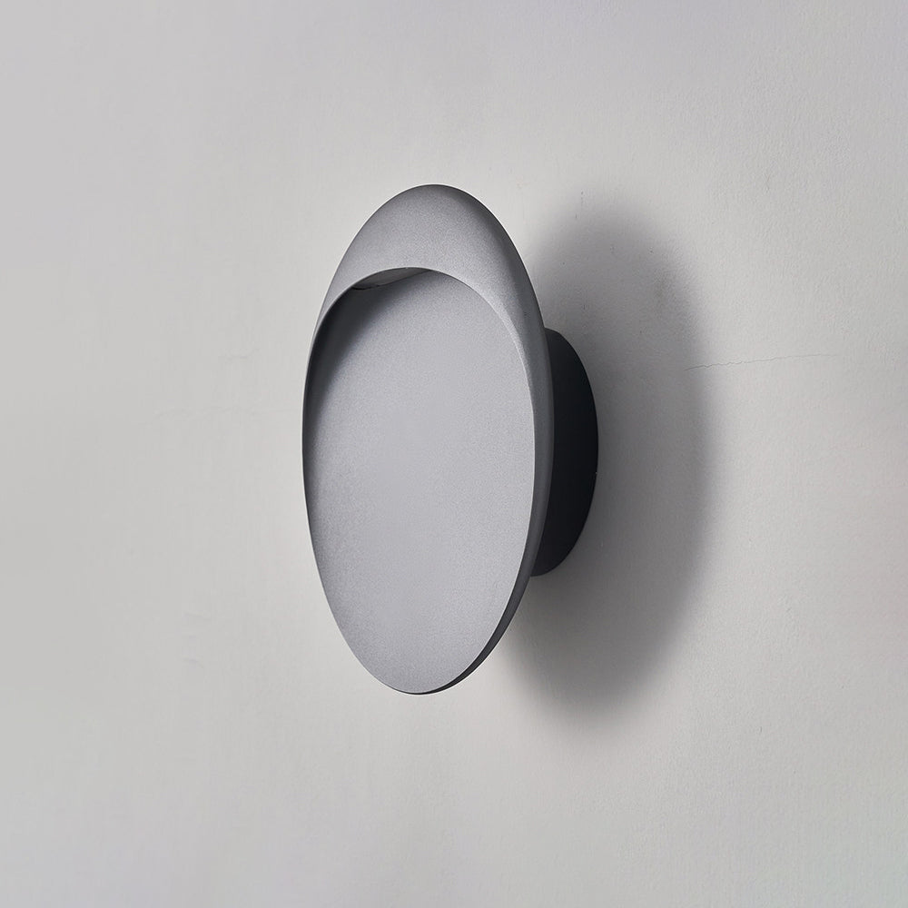 Black Flindt sconce, front view on a white background.