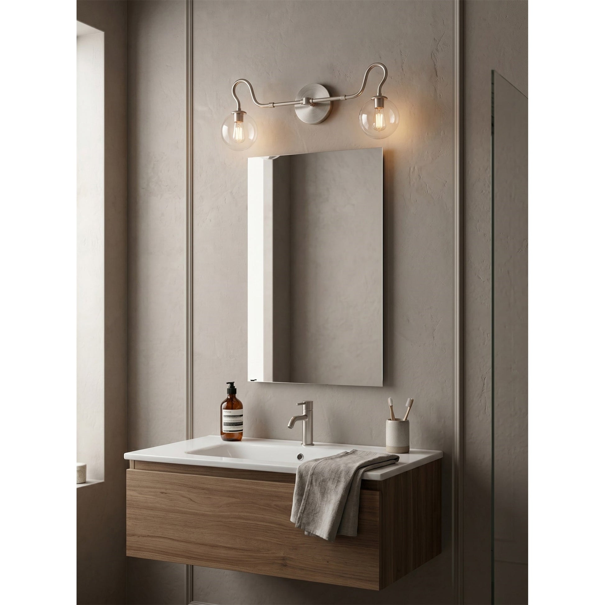 Lifestyle image showing the Floren sconce in a sophisticated entryway.
