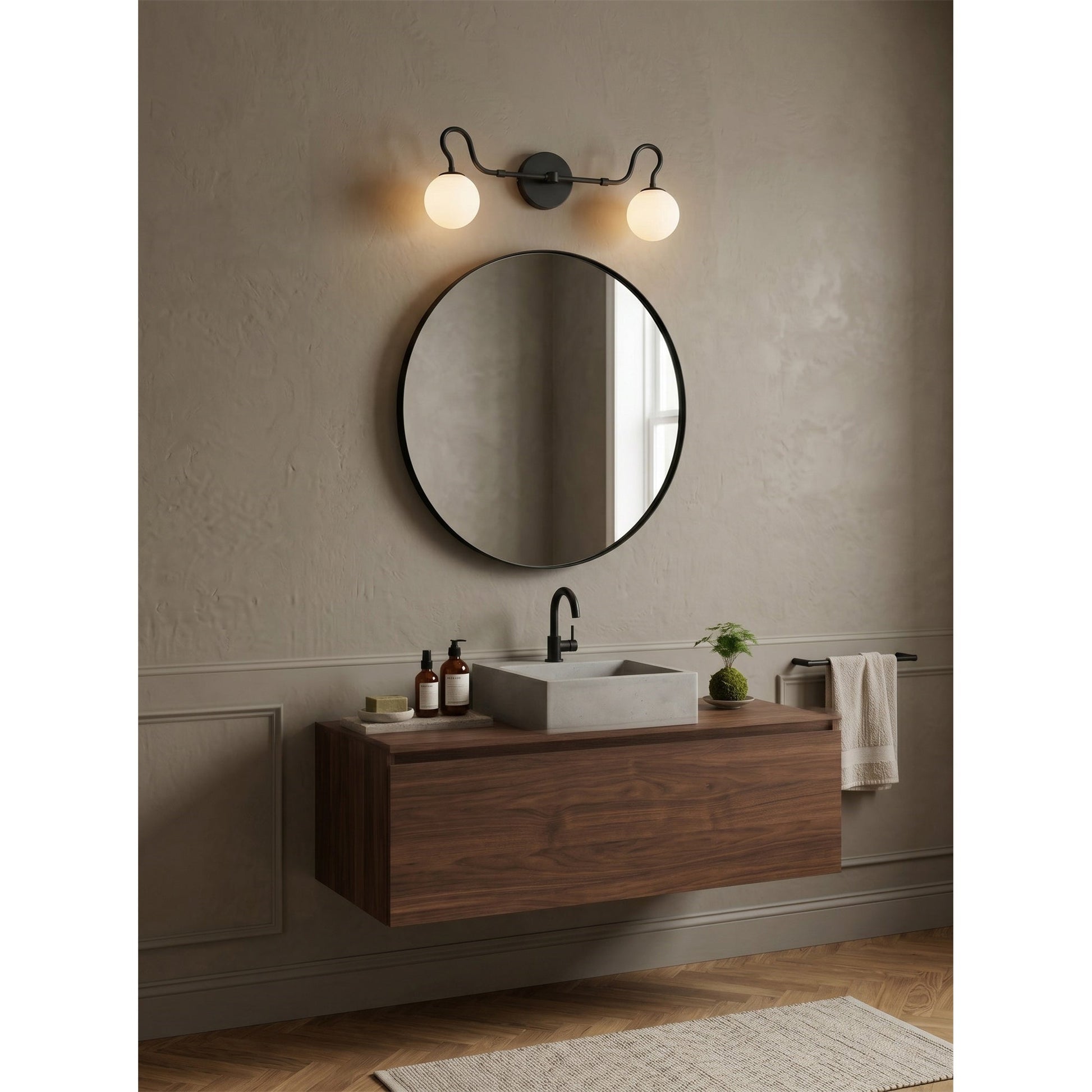 Floren Double Wall Sconce in brass finish with white glass globes.