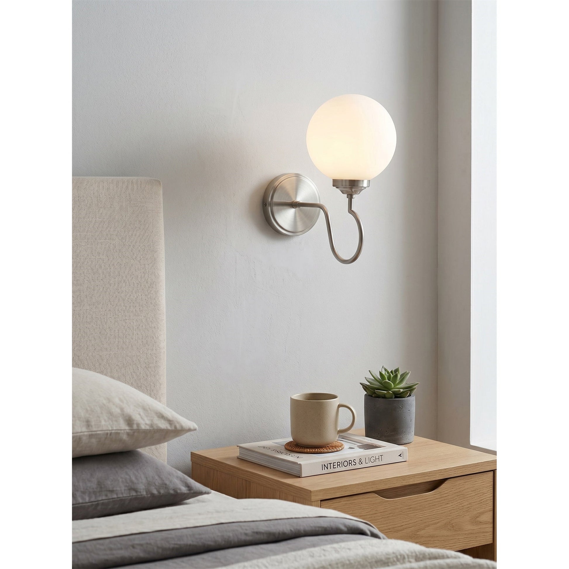 View of the Floren Wall Sconce from below, showing the socket.