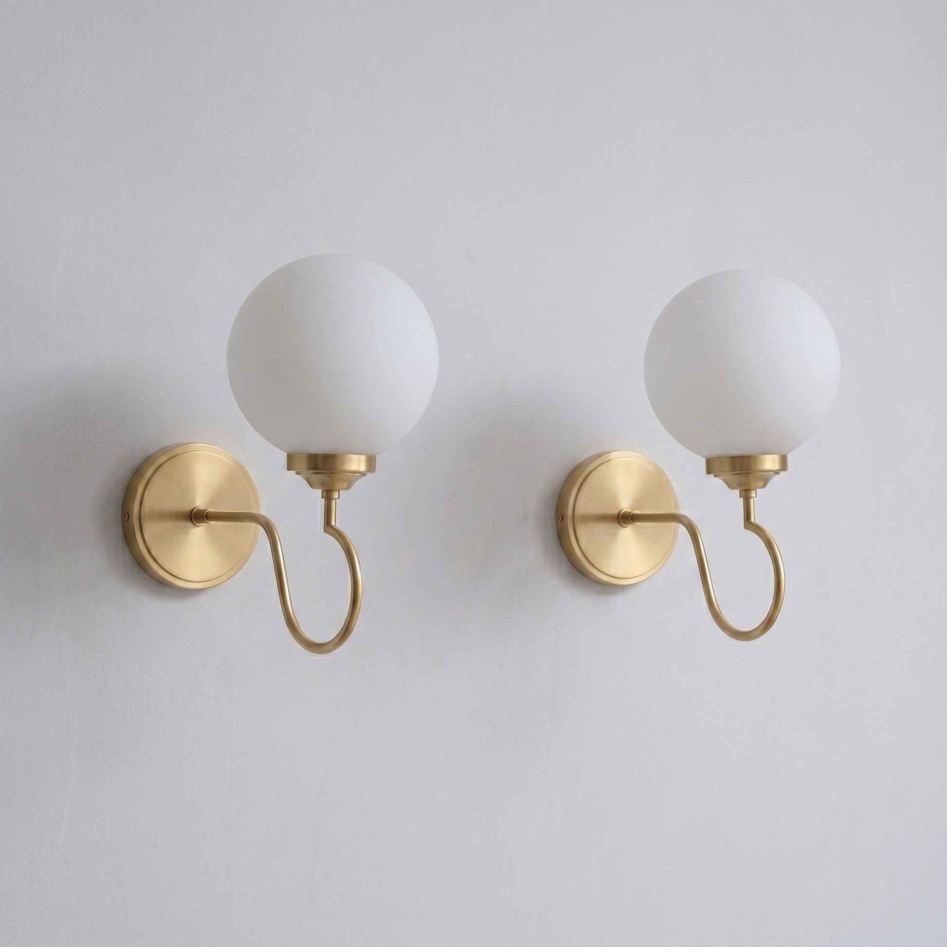 Comparison of the white and clear glass globe shades.