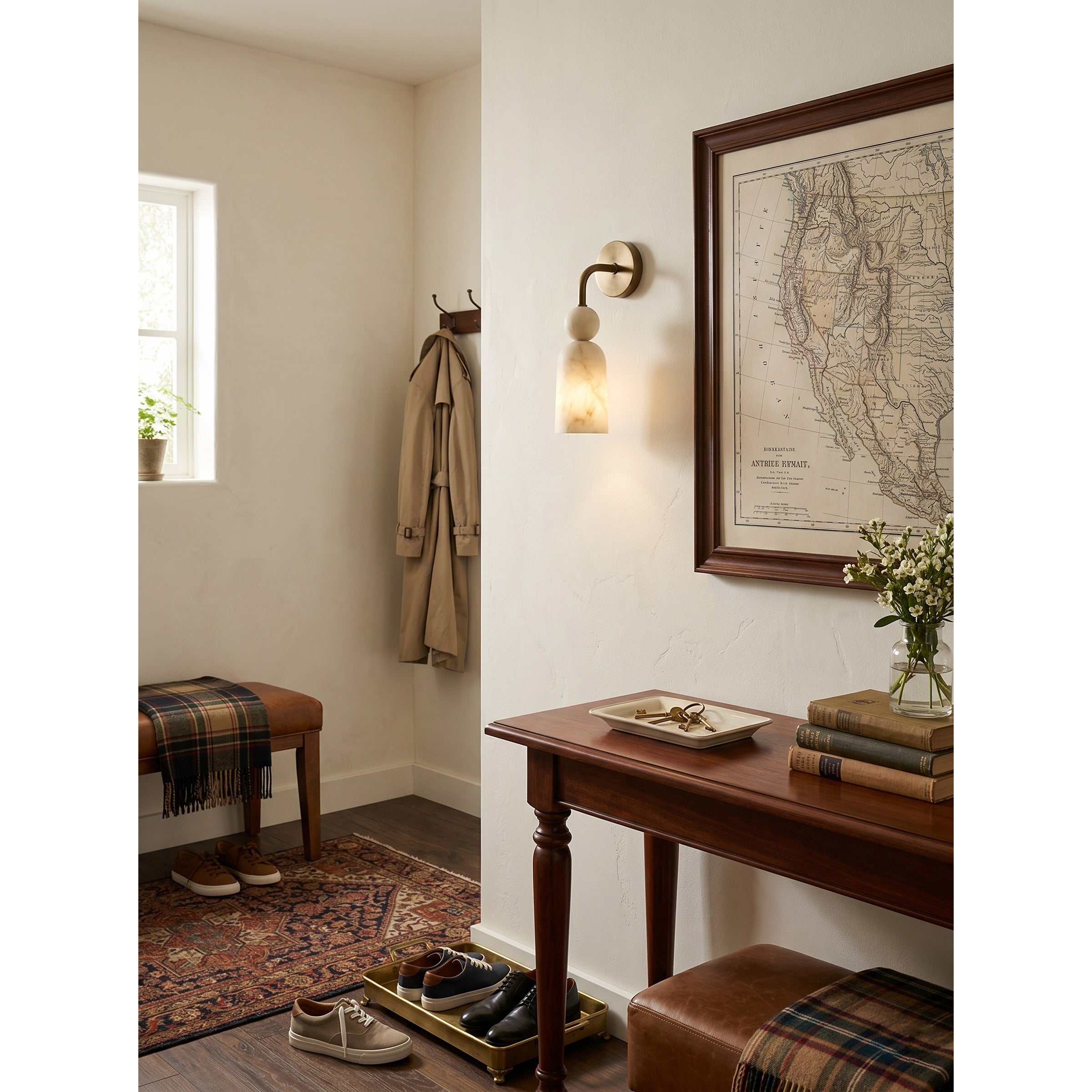 The sconce in a hallway, demonstrating its scale.