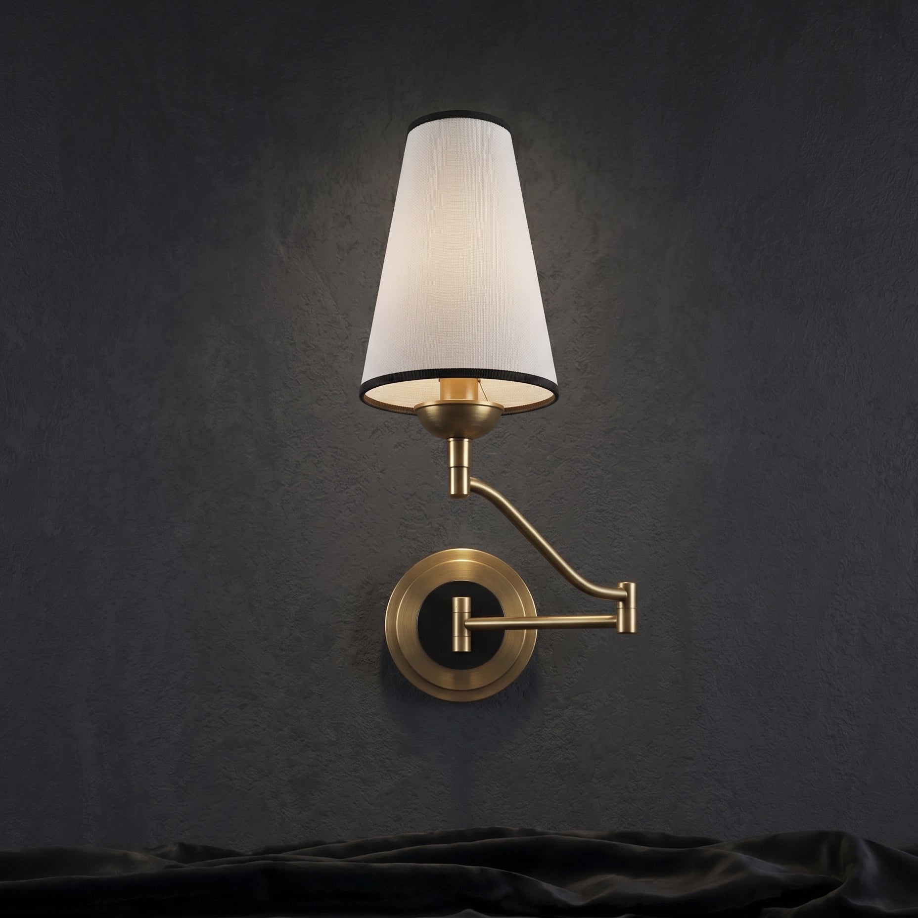 The sconce shown fully extended from the wall.