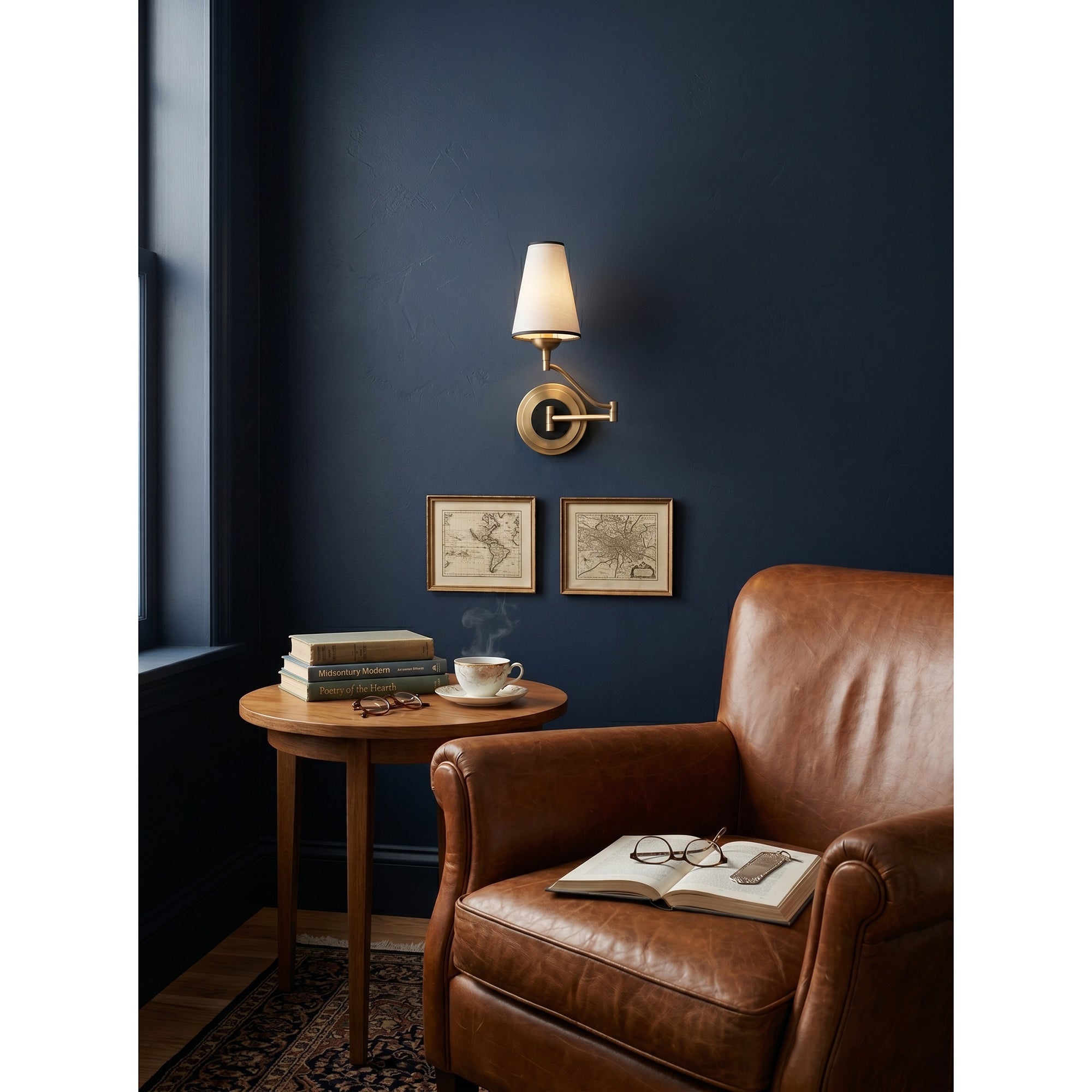 The wall sconce installed above a bedside table in a modern bedroom.