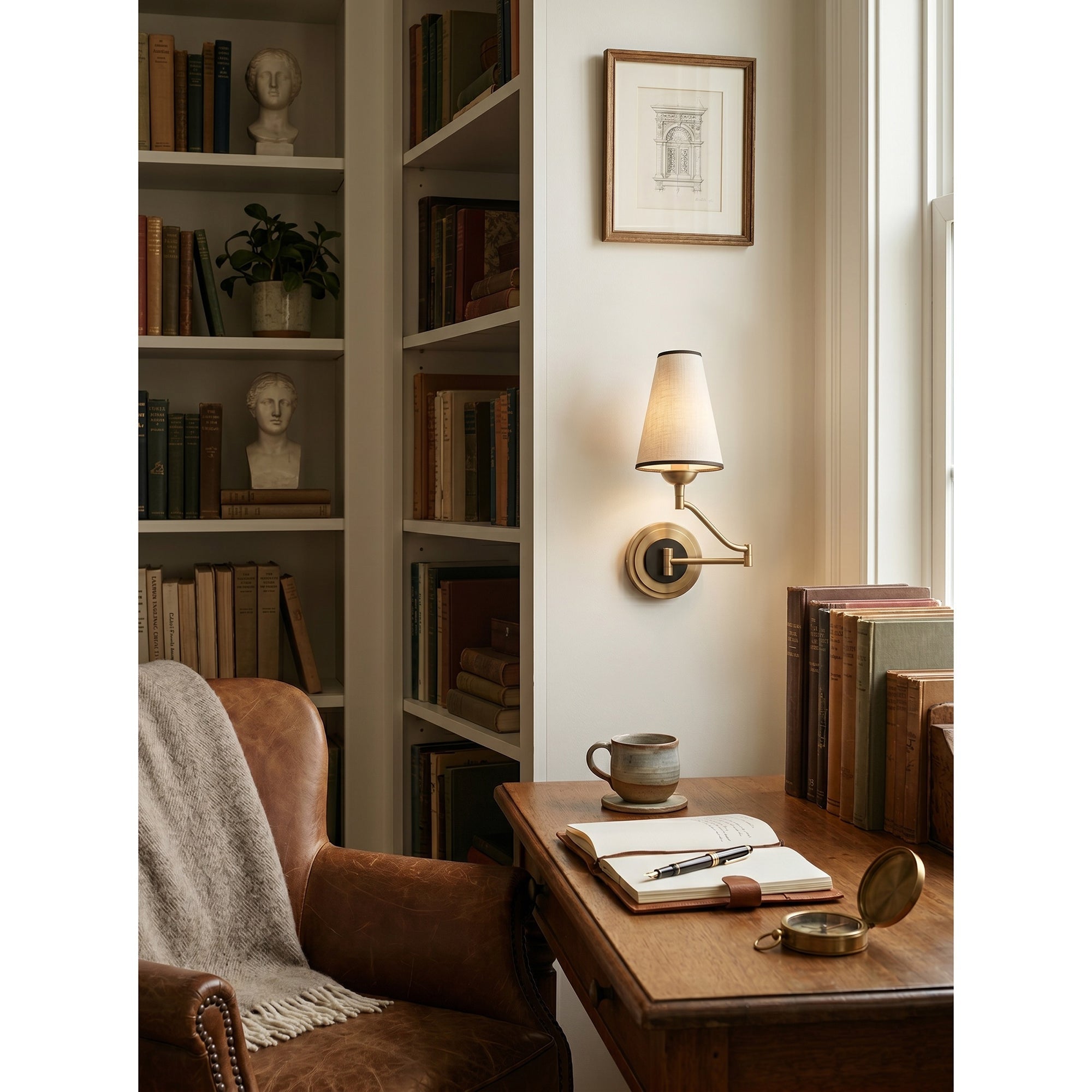 Angled view of the Fontaine Wall Sconce showing its full articulation.