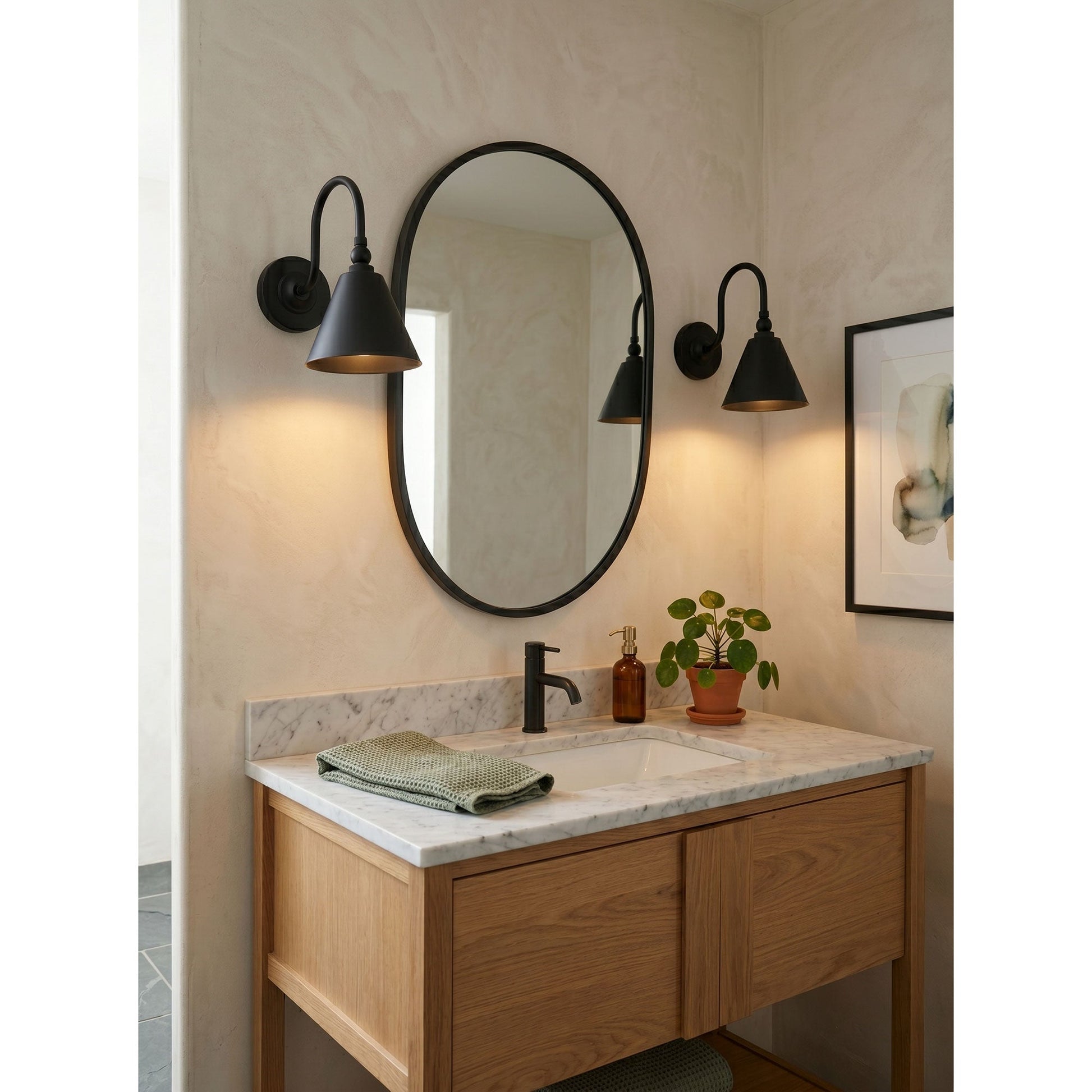 Side profile of the Forna Wall Sconce in a matte black finish.
