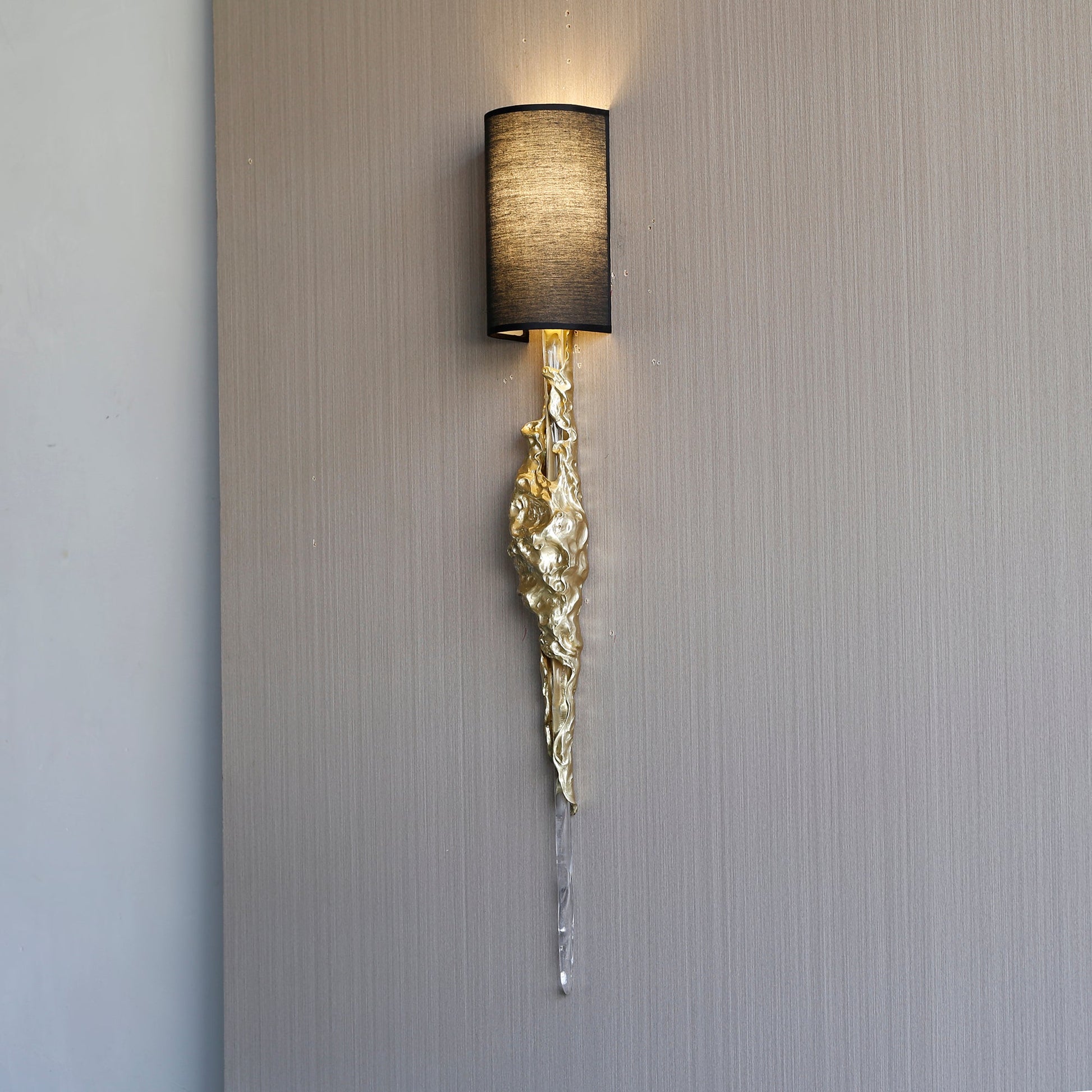 The Fusion Wall Sconce shown unlit to highlight its quality as a piece of wall art.