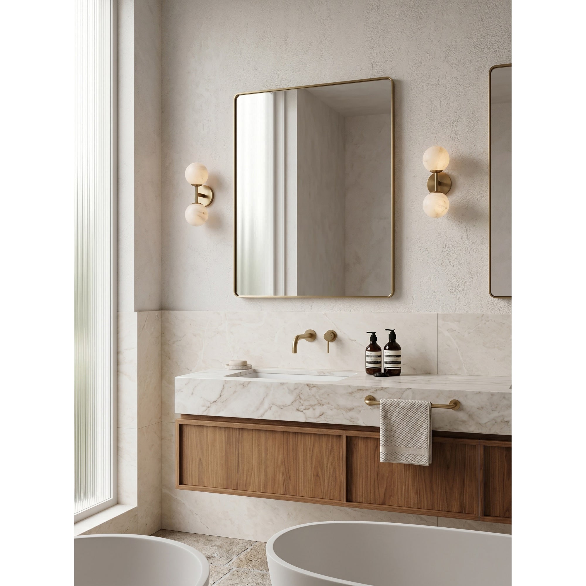 Lifestyle image of the single-head sconce in a curated interior.