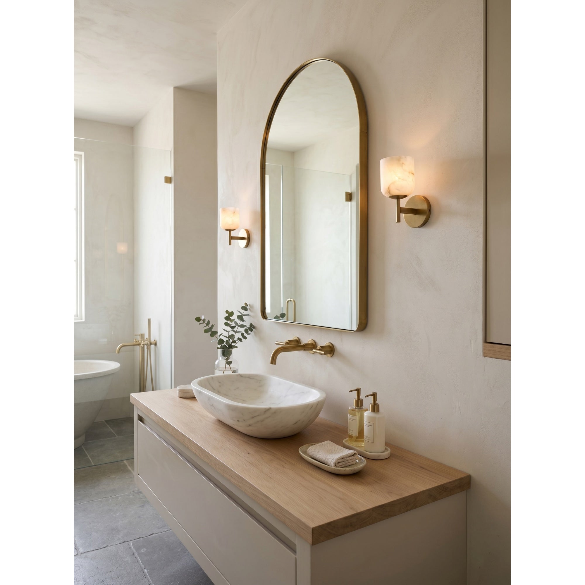 Lifestyle image of the double-head sconce in a hallway.