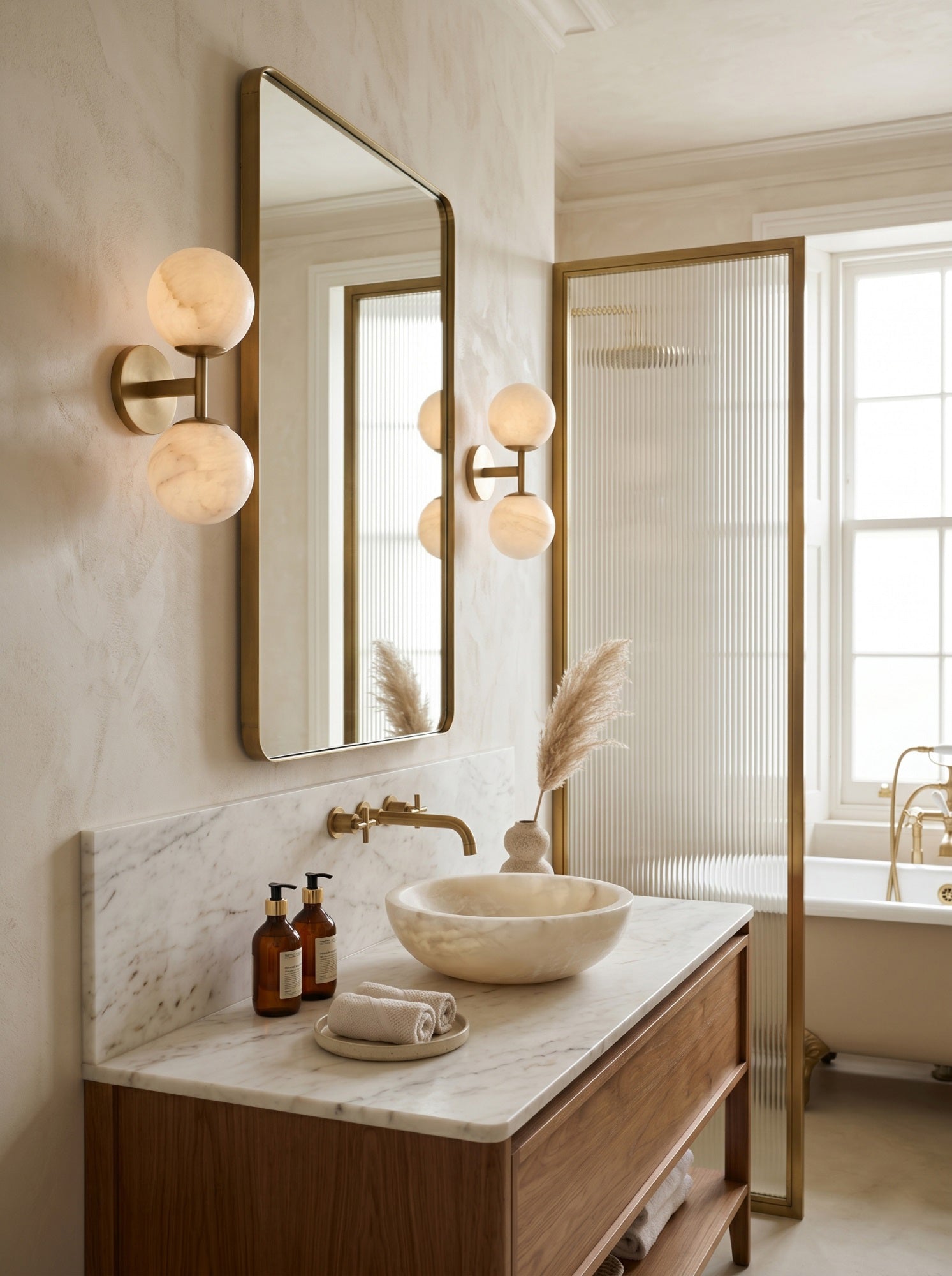 Front view of the Garrison Alabaster Wall Sconce against a neutral wall.