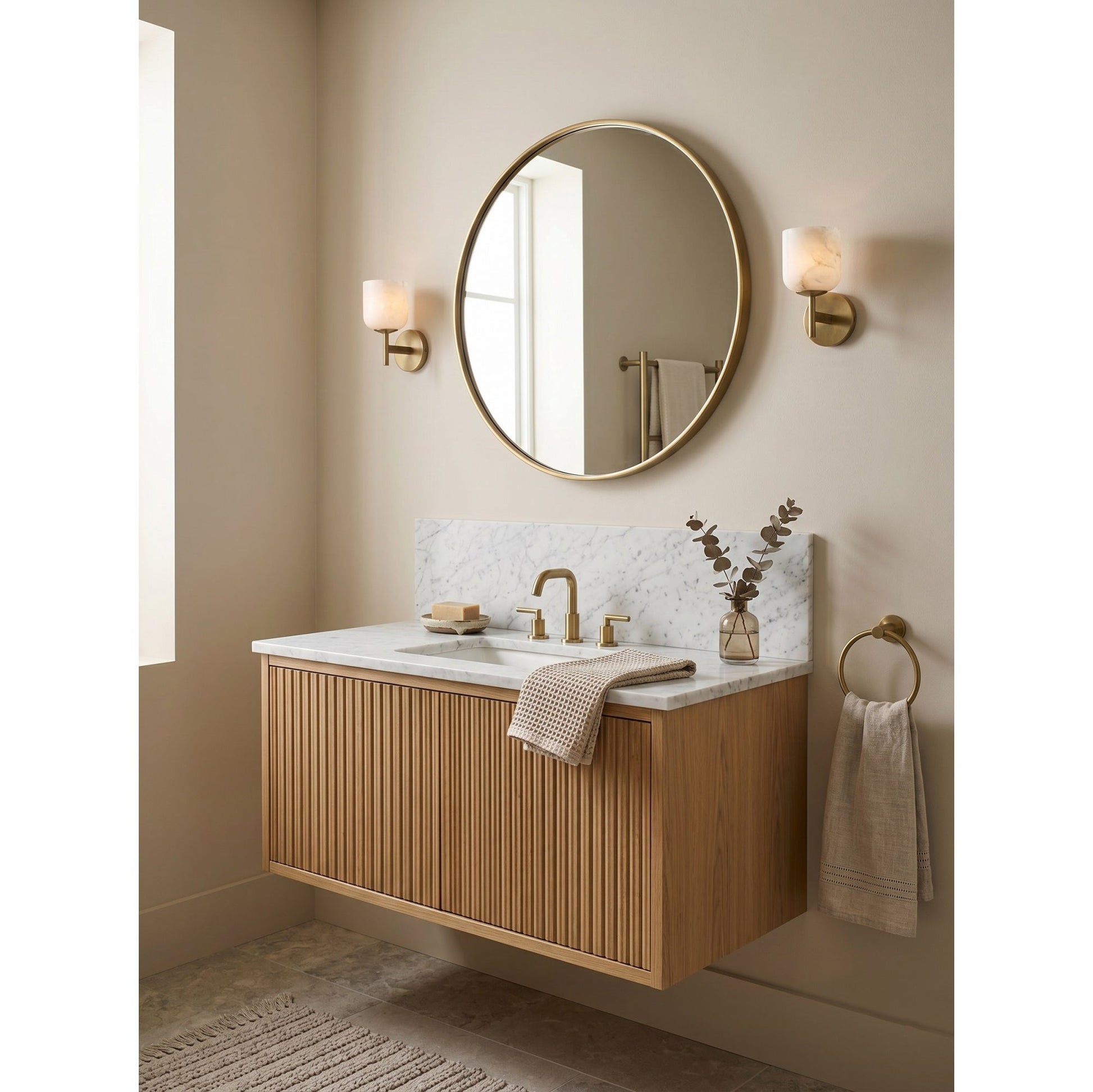 Garrison Alabaster Wall Sconce installed in a modern living room setting.