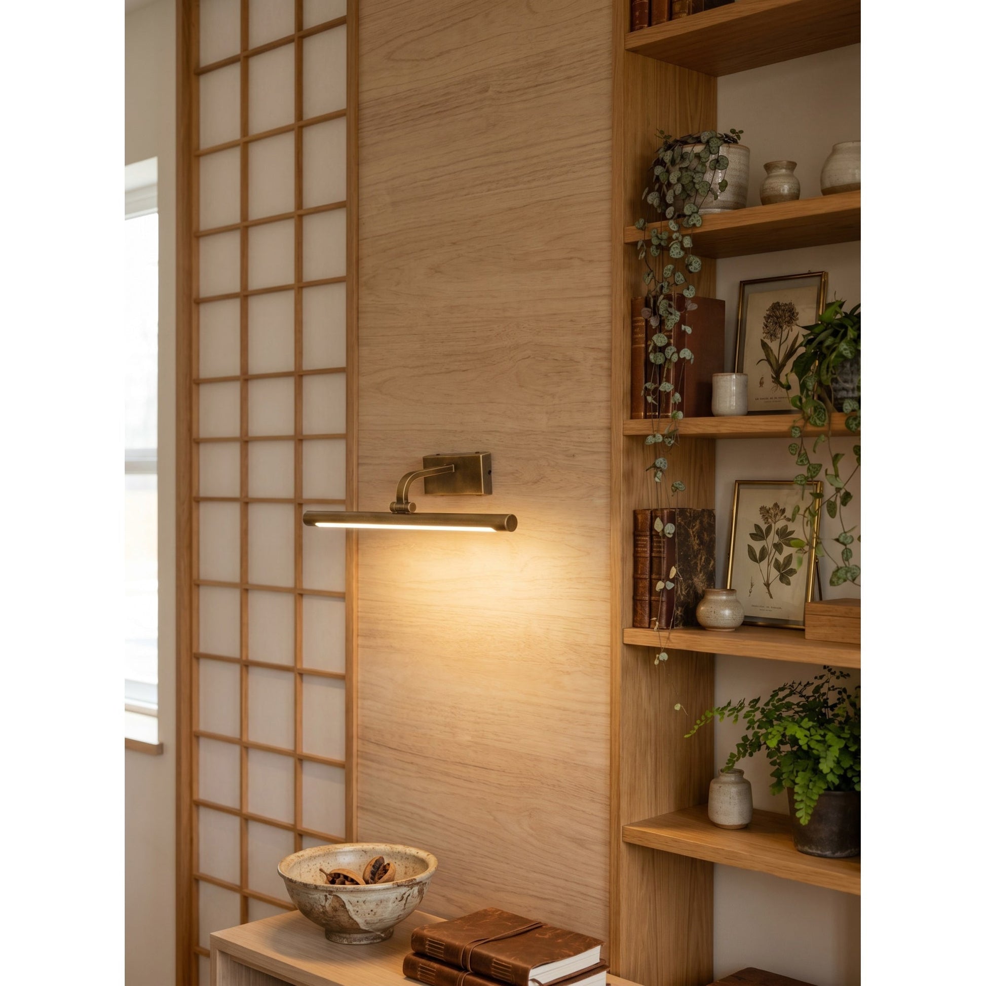 Goya Brass Wall Sconce with its built-in touch dimmer switch highlighted.