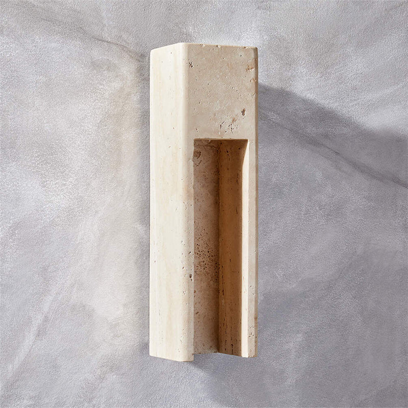 Lifestyle image of the sconce in a contemporary bathroom vanity setting.