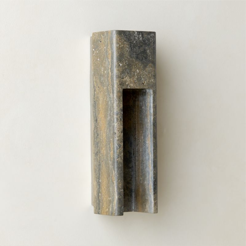 Angled view highlighting the depth and carved design of the sconce.