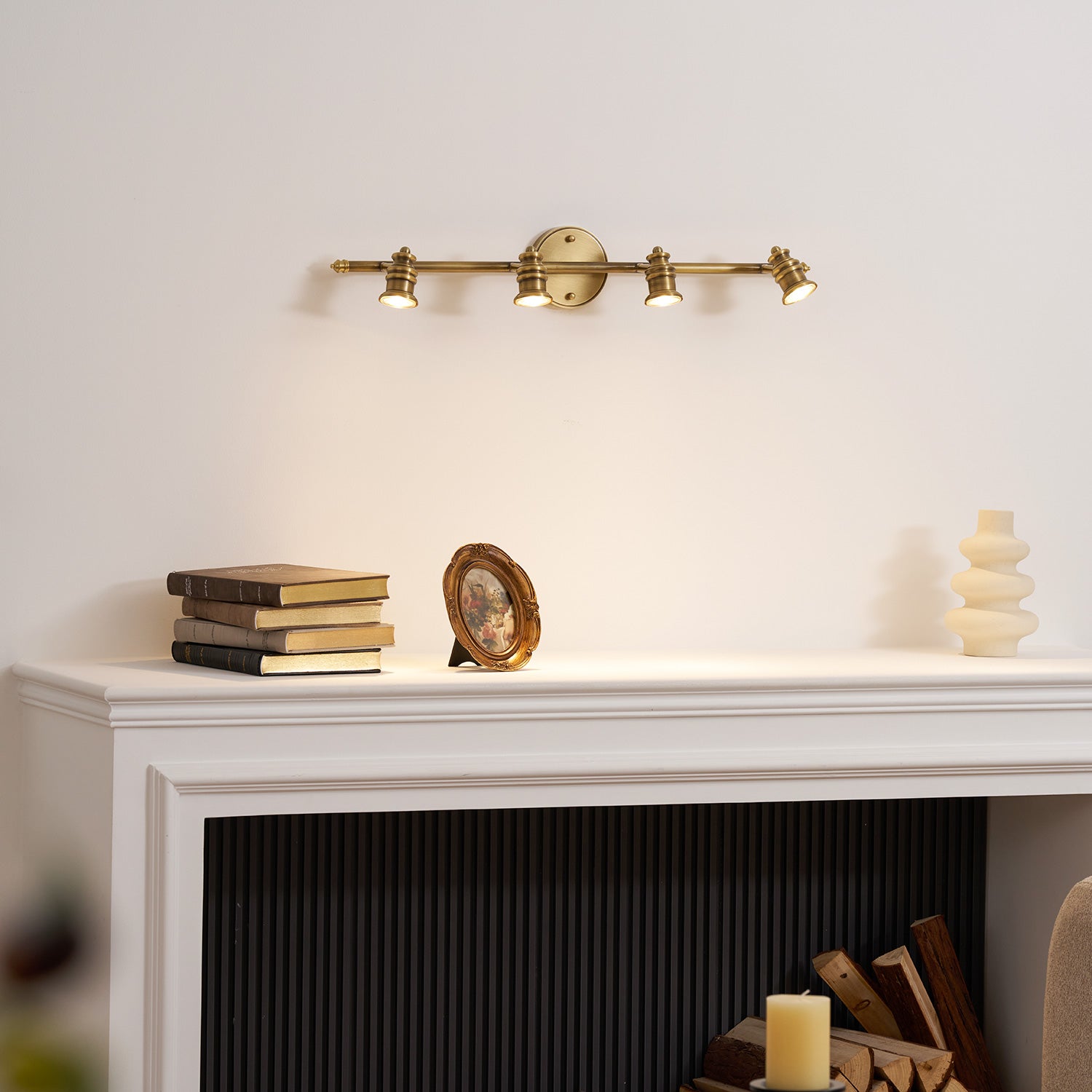 The single-head lamp highlighting a piece of art.