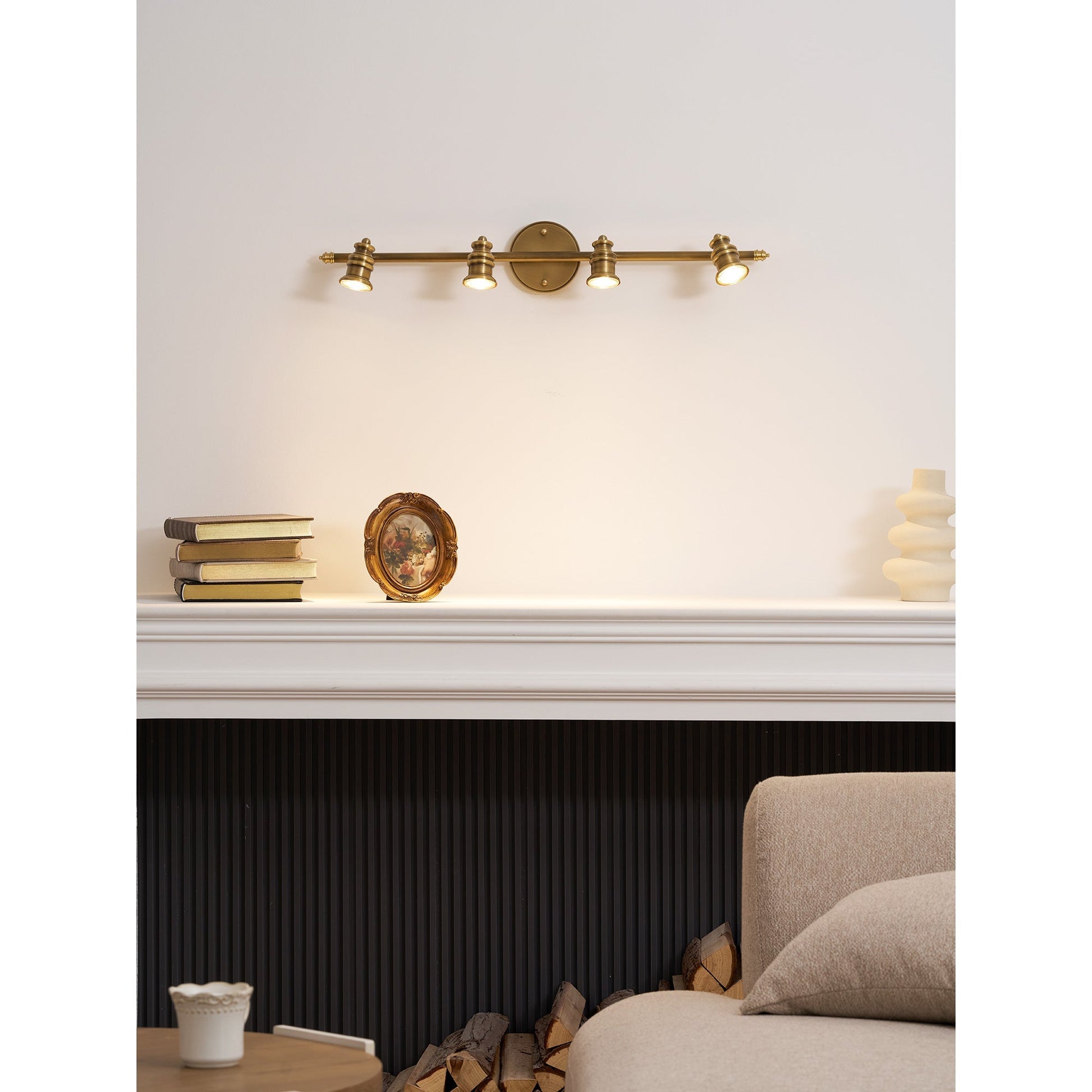 The two-head lamp over a small vanity.