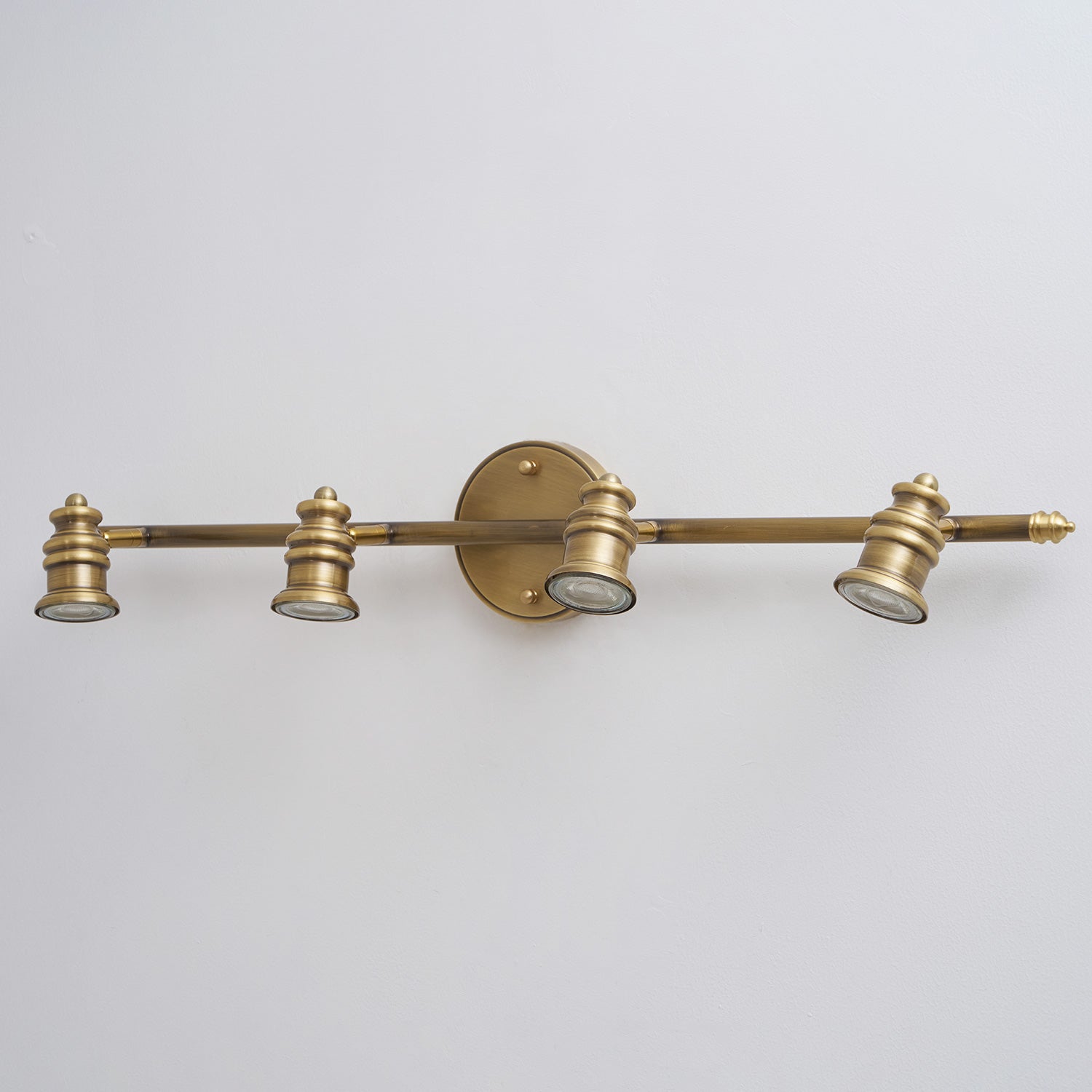 The Halophane Brass Wall Lamp series shown together.