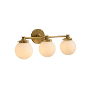 Hayes Glass Ball Wall Sconce with a single frosted globe and brass finish.