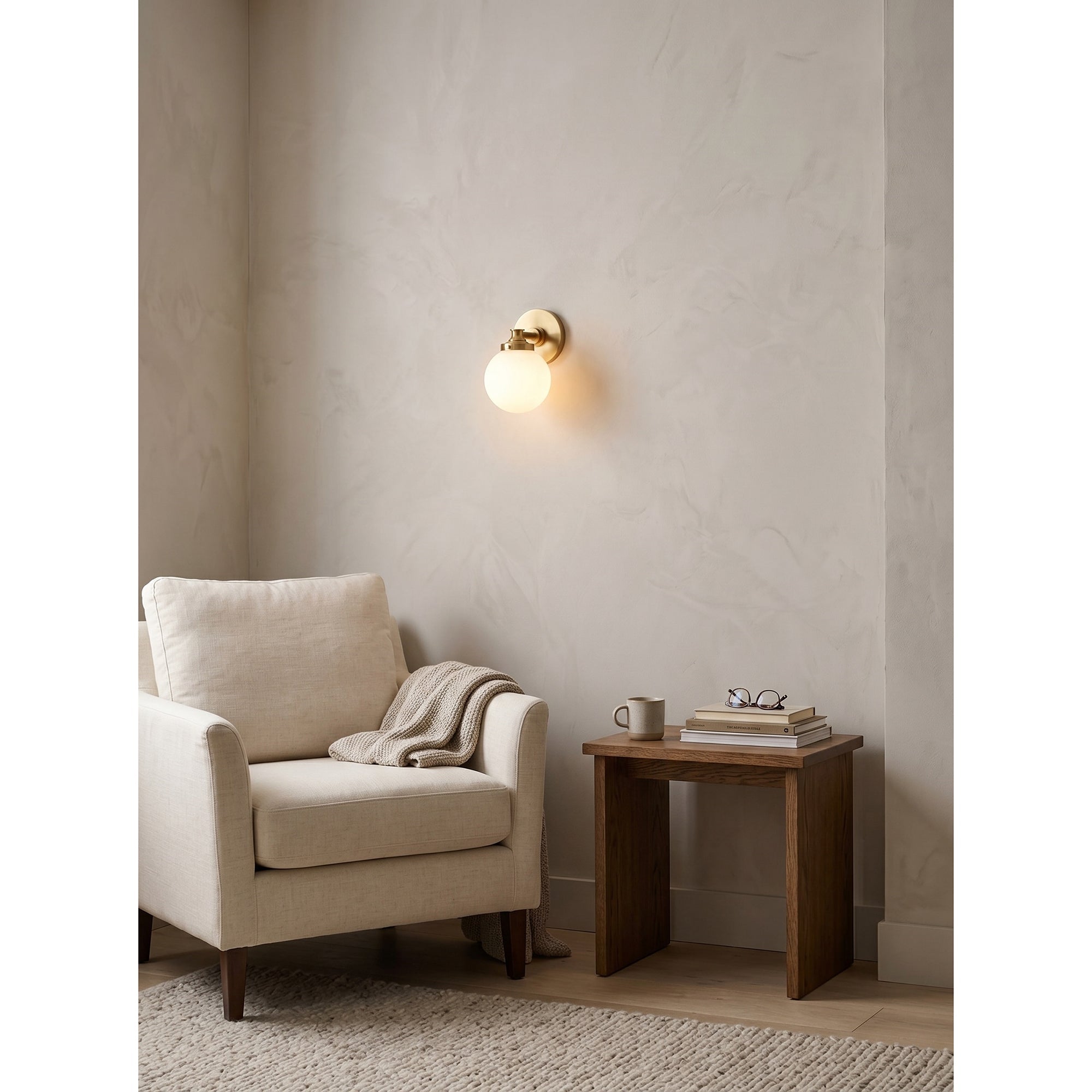 The Hayes sconce shown with a candelabra base bulb (not included).