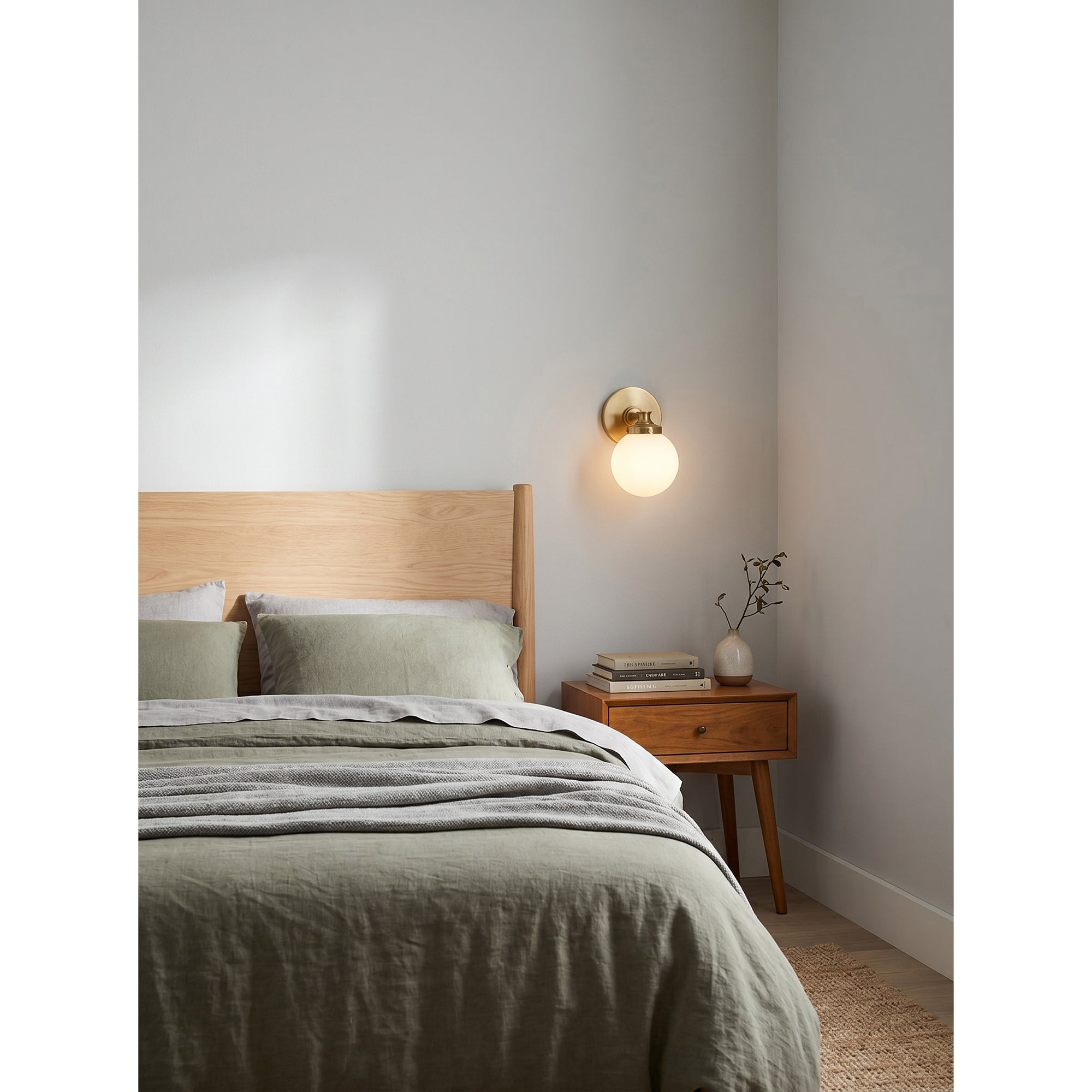 The Hayes sconce from a side profile, showing its projection from the wall.