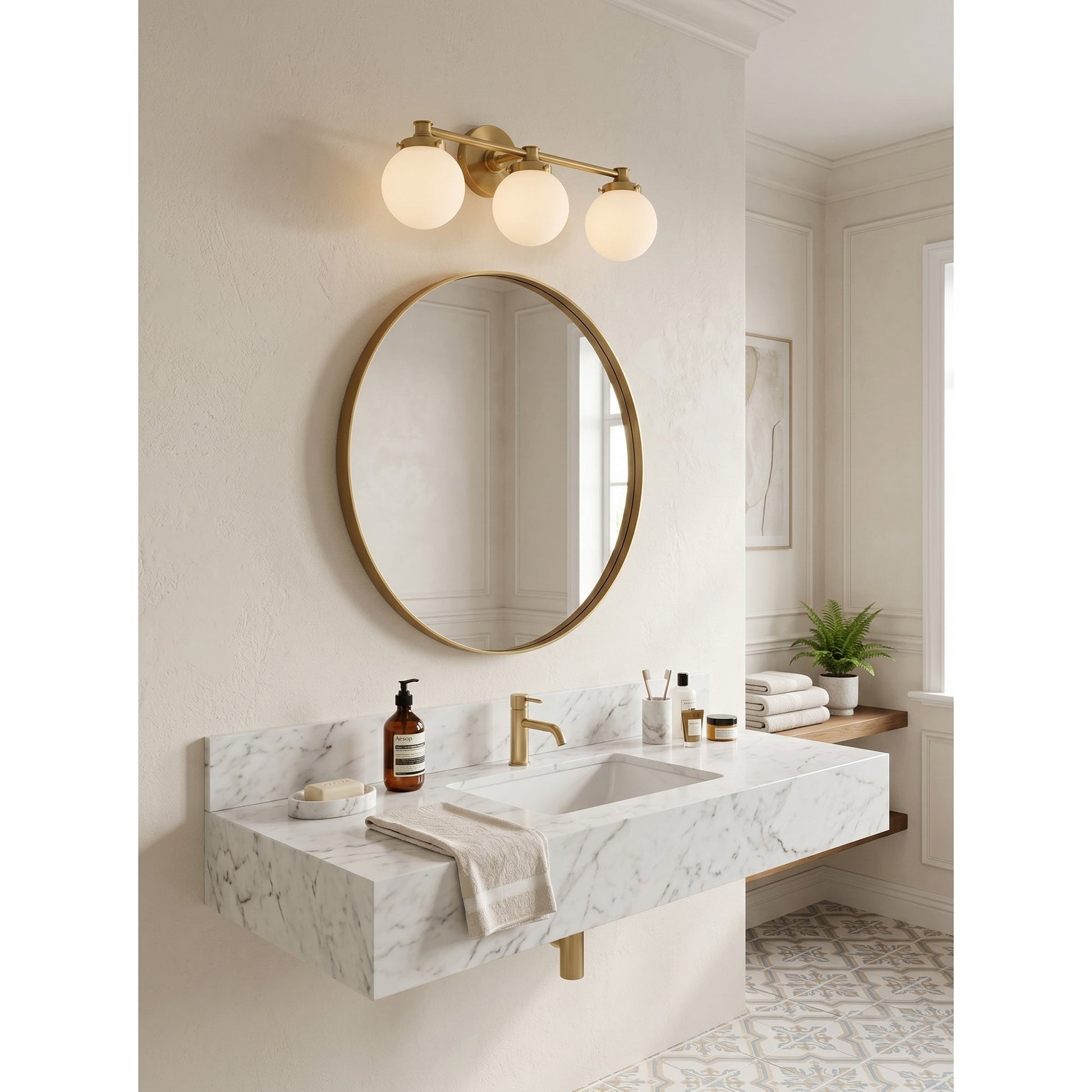 A lifestyle view of the Hayes sconce providing warm light in a powder room.